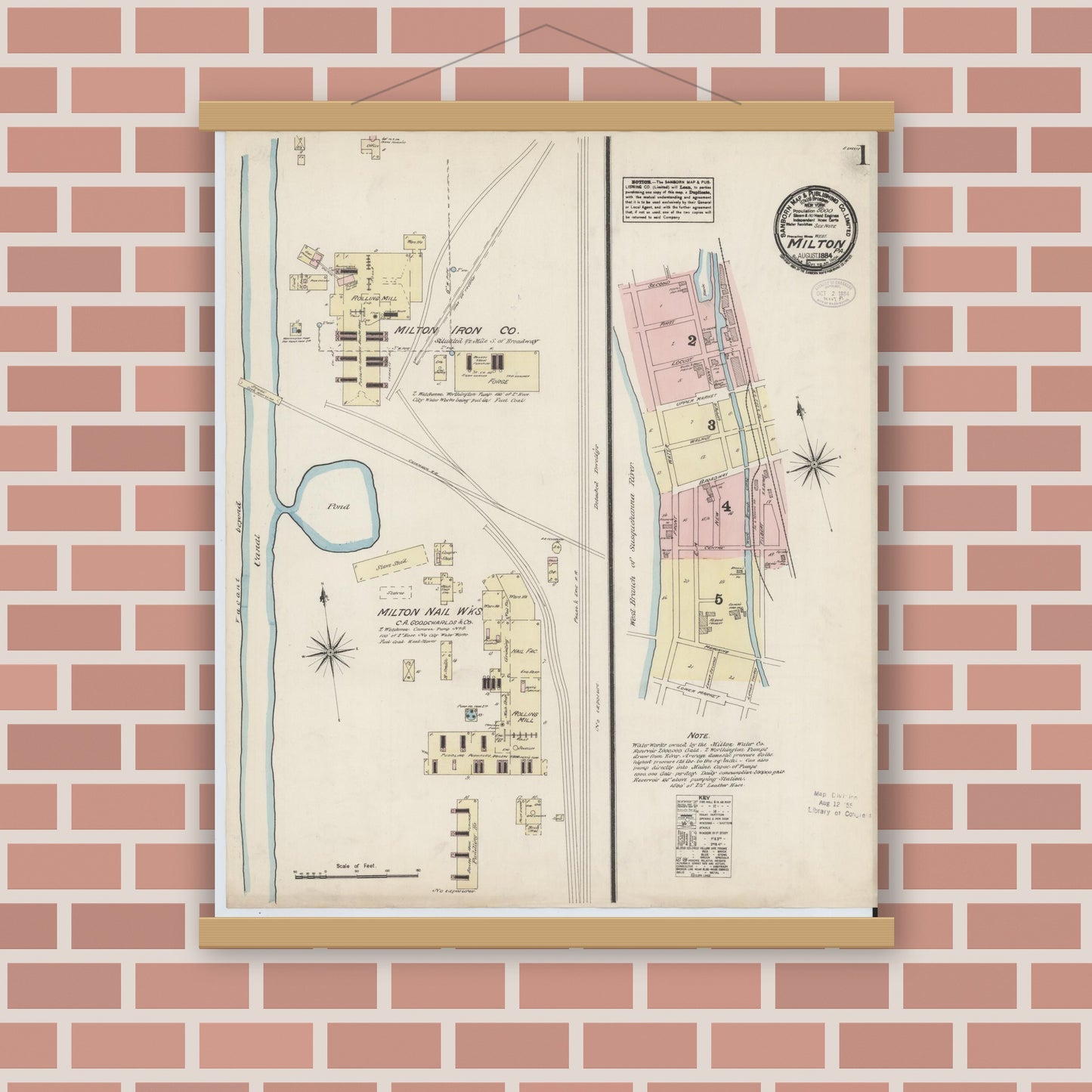 Old map wall art mockup — magnetic wood frame on brick wall — Sanborn Fire Insurance Map from Milton, Northumberland County, Pennsylvania (1884), Sheet #0001