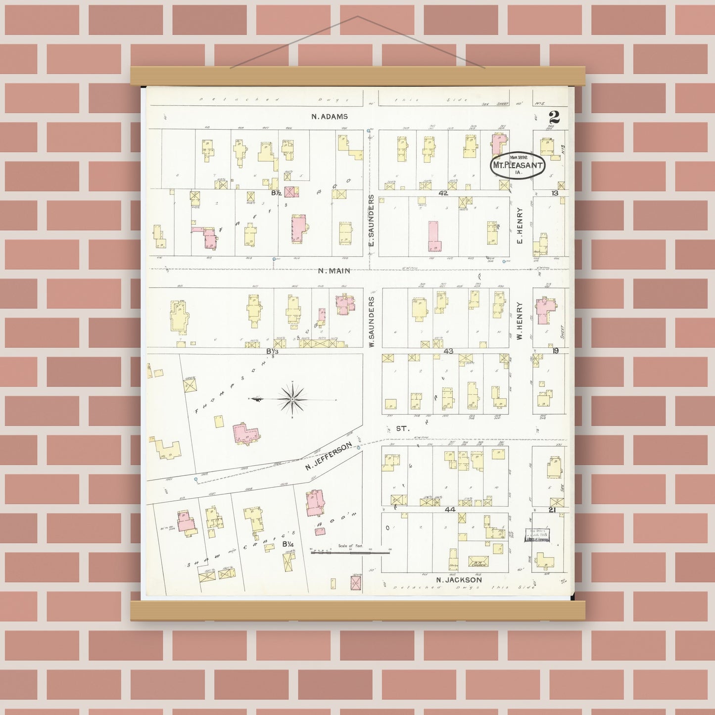 Old map wall art mockup — magnetic wood frame on brick wall — Sanborn Fire Insurance Map from Mount Pleasant, Henry County, Iowa (1892), Sheet #0002