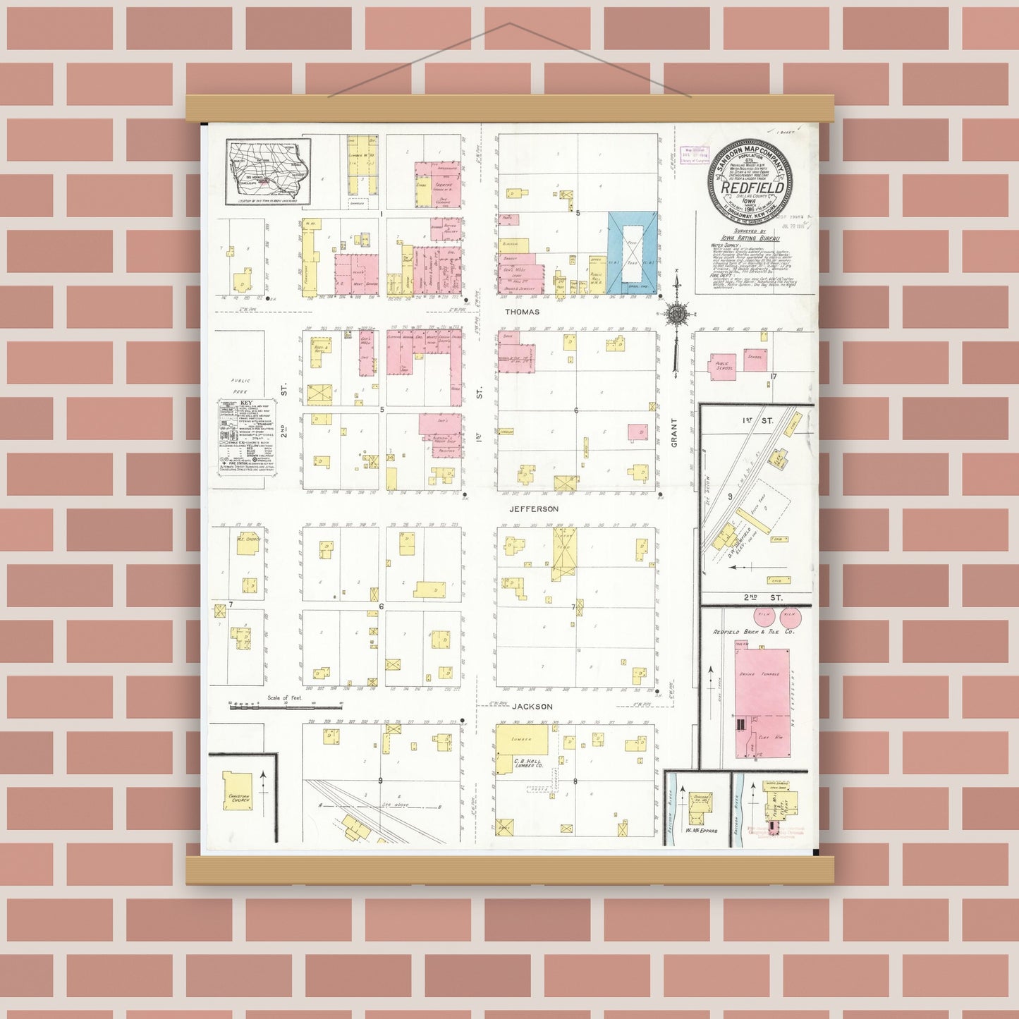 Old map wall art mockup — magnetic wood frame on brick wall — Sanborn Fire Insurance Map from Redfield, Dallas County, Iowa (1916), Sheet #0001