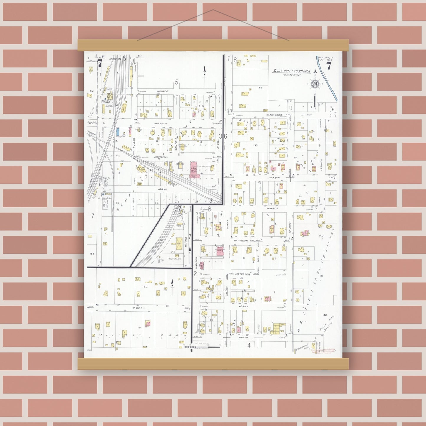 Old map wall art mockup — magnetic wood frame on brick wall — Sanborn Fire Insurance Map from Sullivan, Moultrie County, Illinois (1932), Sheet #0007