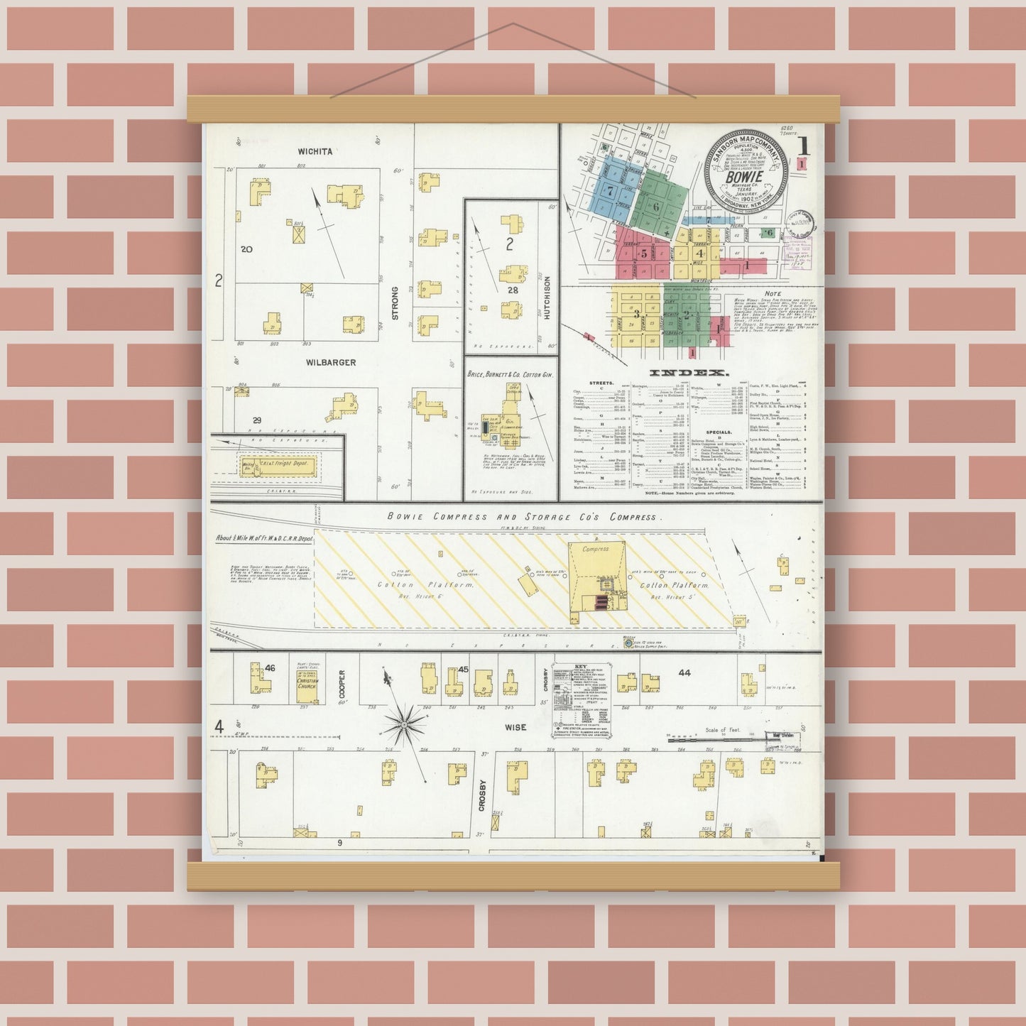Old map wall art mockup — magnetic wood frame on brick wall — Sanborn Fire Insurance Map from Bowie, Montague County, Texas (1902), Sheet #0001