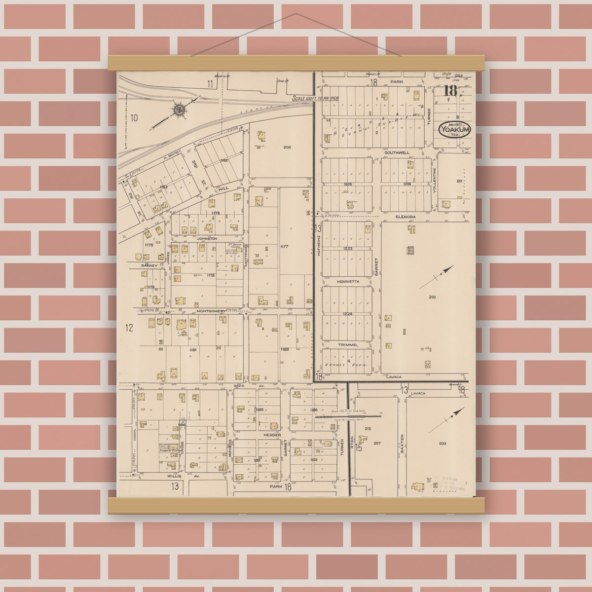 Old map wall art mockup — magnetic wood frame on brick wall — Sanborn Fire Insurance Map from Yoakum, De Witt And Lavaca Counties, Texas (1922), Sheet #0018