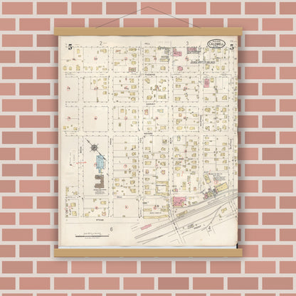 Old map wall art mockup — magnetic wood frame on brick wall — Sanborn Fire Insurance Map from Caldwell, Burleson County, Texas (1943), Sheet #0005