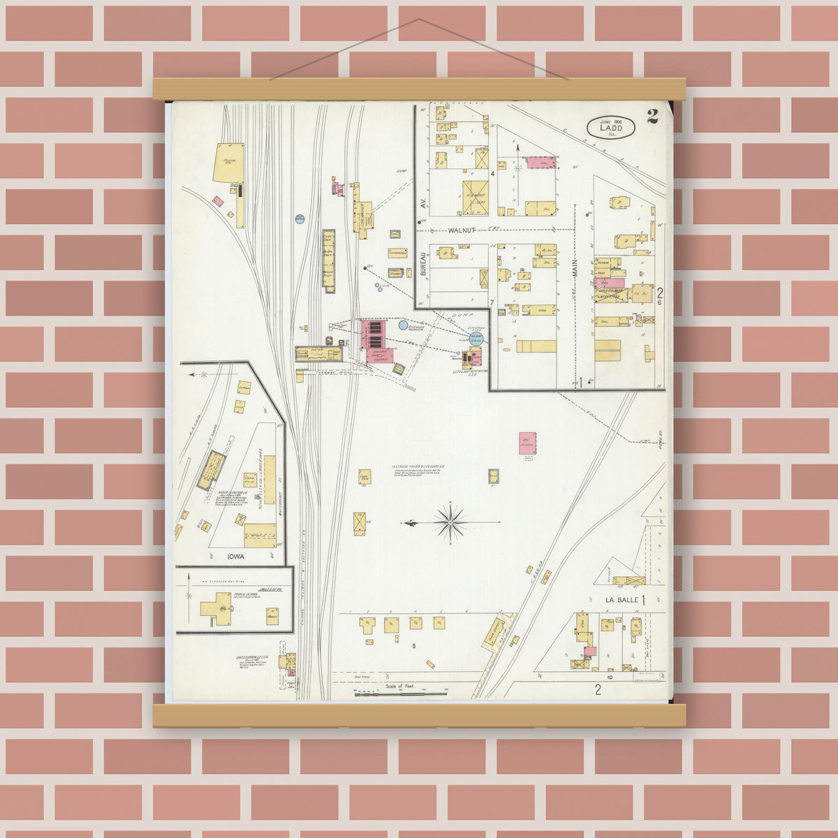 Old map wall art mockup — magnetic wood frame on brick wall — Sanborn Fire Insurance Map from Ladd, Bureau County, Illinois (1906), Sheet #0002