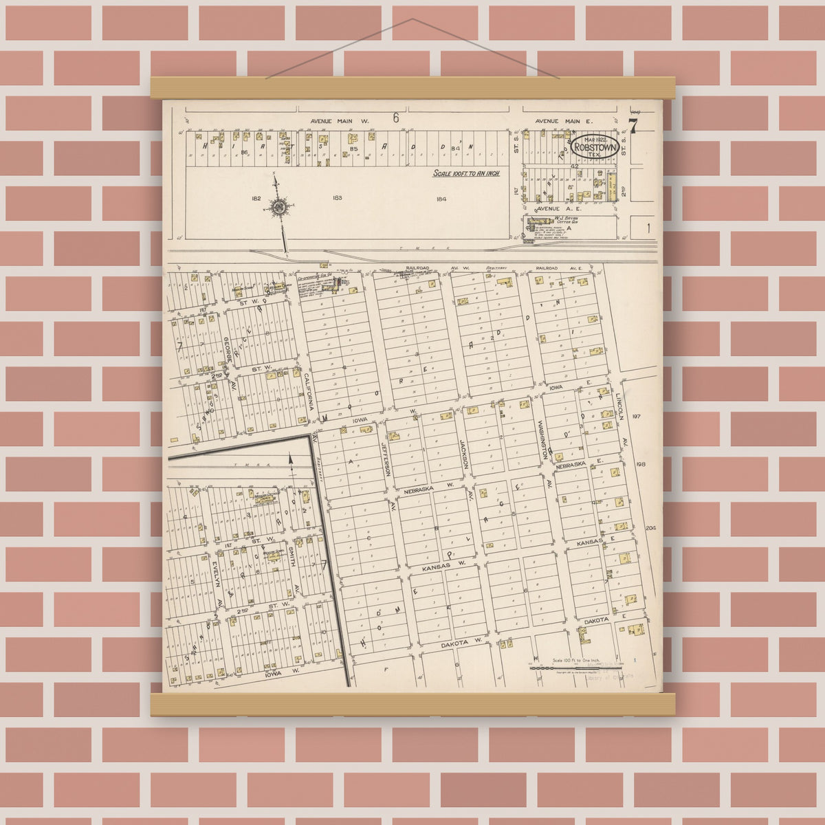 Old map wall art mockup — magnetic wood frame on brick wall — Sanborn Fire Insurance Map from Robstown, Nueces County, Texas (1922), Sheet #0007