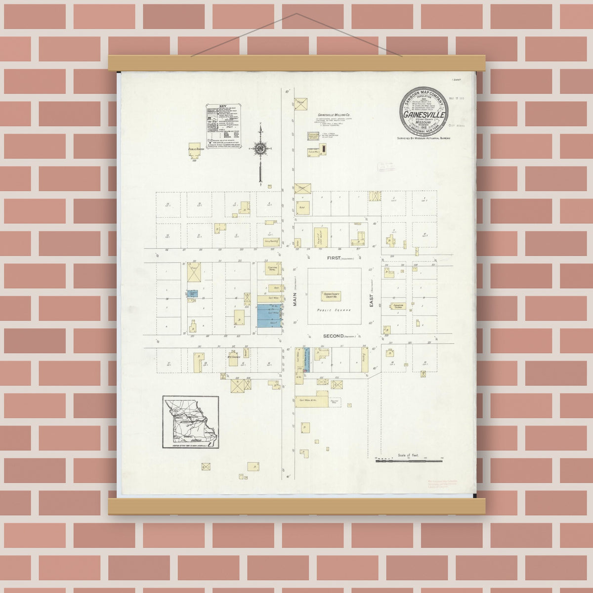 Old map wall art mockup — magnetic wood frame on brick wall — Sanborn Fire Insurance Map from Gainesville, Ozark County, Missouri (1912), Sheet #0001