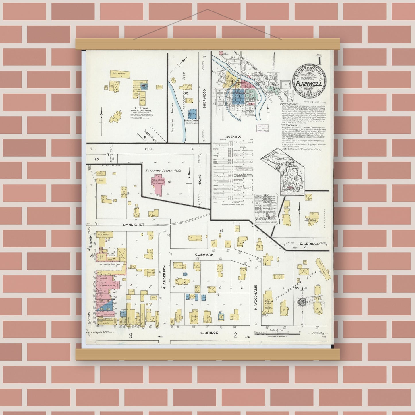 Old map wall art mockup — magnetic wood frame on brick wall — Sanborn Fire Insurance Map from Plainwell, Allegan County, Michigan (1918), Sheet #0001