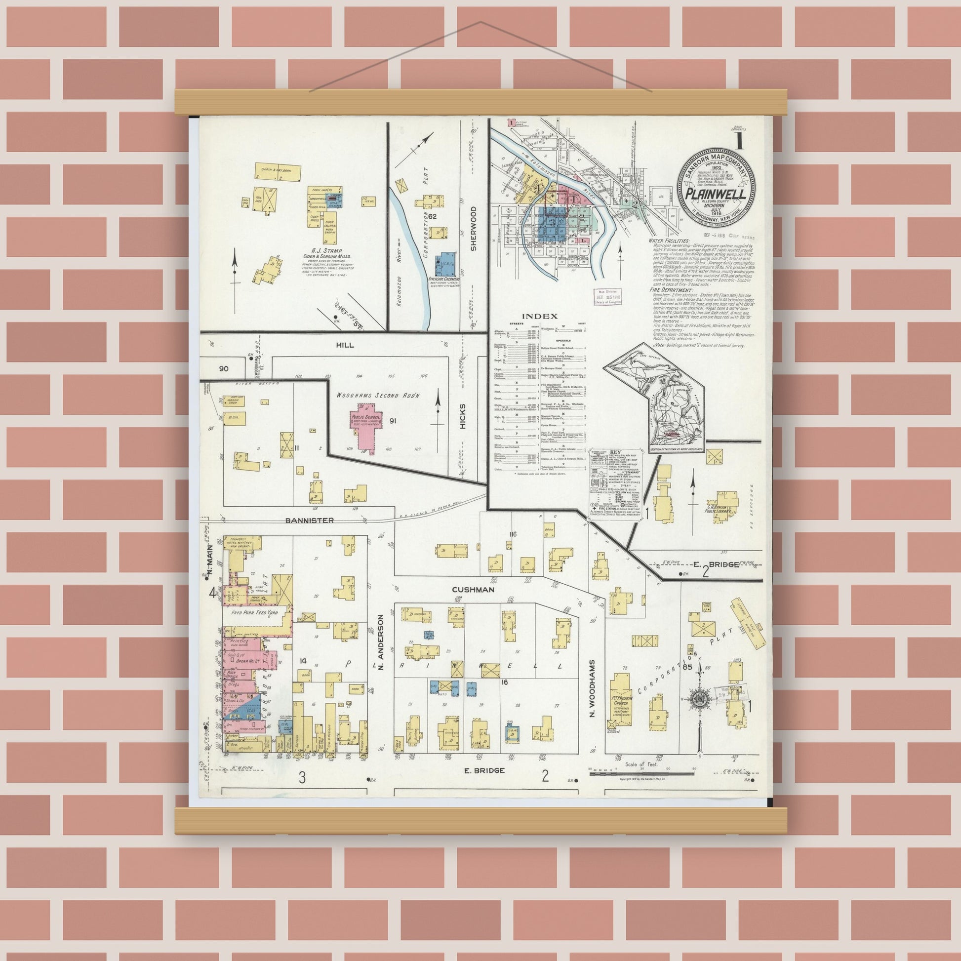 Old map wall art mockup — magnetic wood frame on brick wall — Sanborn Fire Insurance Map from Plainwell, Allegan County, Michigan (1918), Sheet #0001