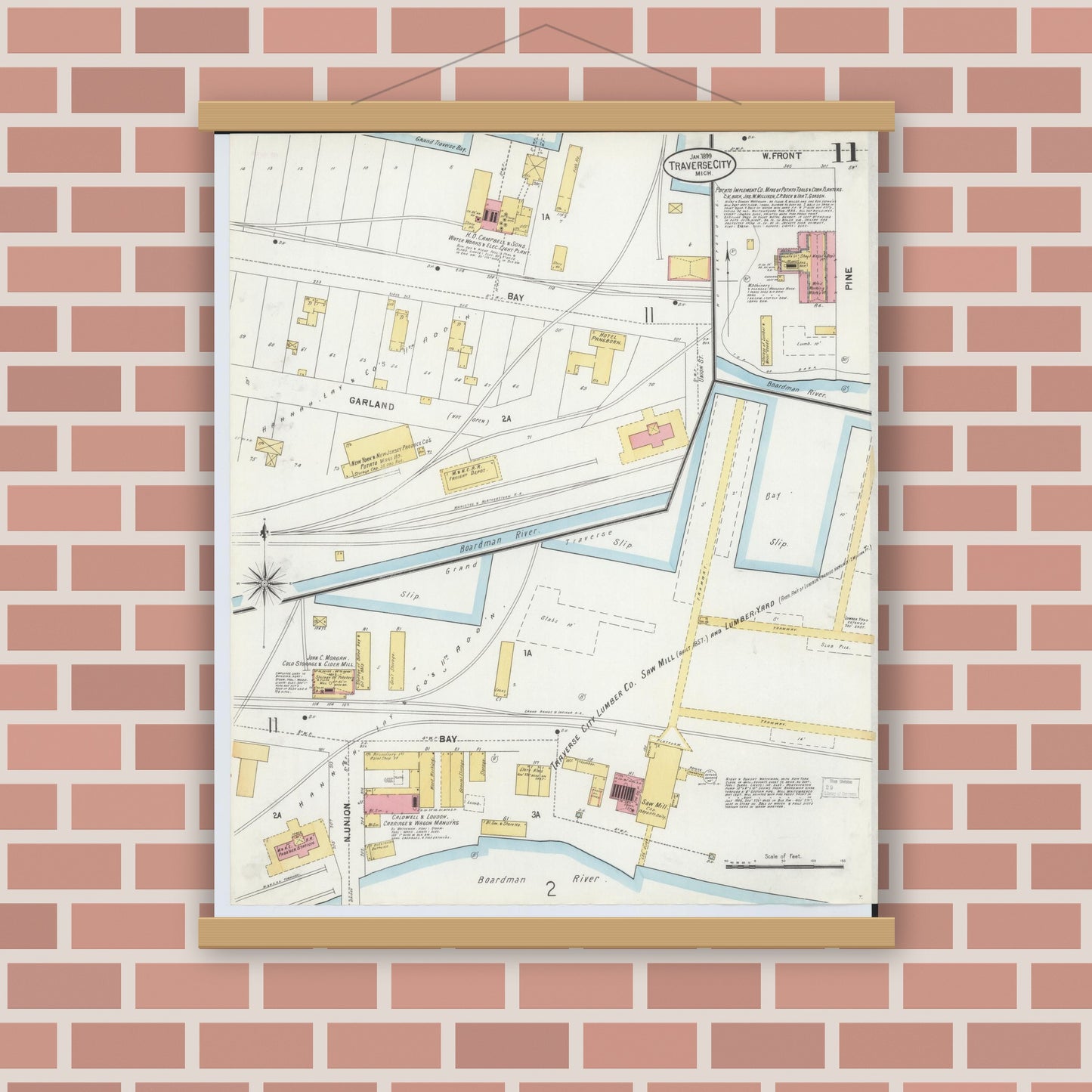 Old map wall art mockup — magnetic wood frame on brick wall — Sanborn Fire Insurance Map from Traverse City, Grand Traverse County, Michigan (1899), Sheet #0011