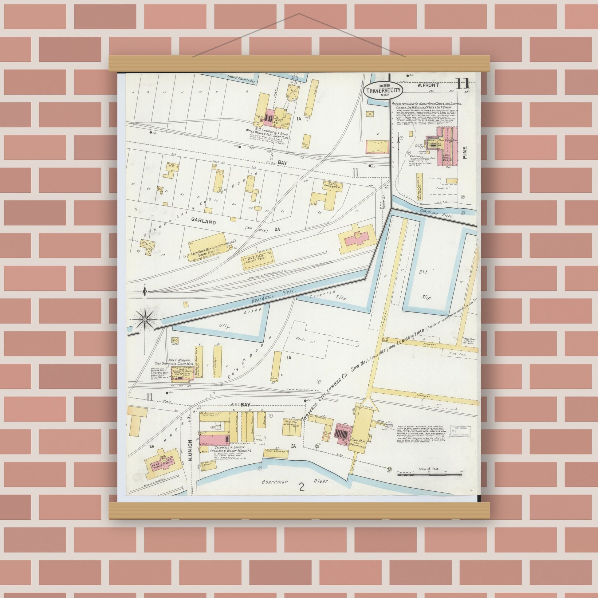 Old map wall art mockup — magnetic wood frame on brick wall — Sanborn Fire Insurance Map from Traverse City, Grand Traverse County, Michigan (1899), Sheet #0011