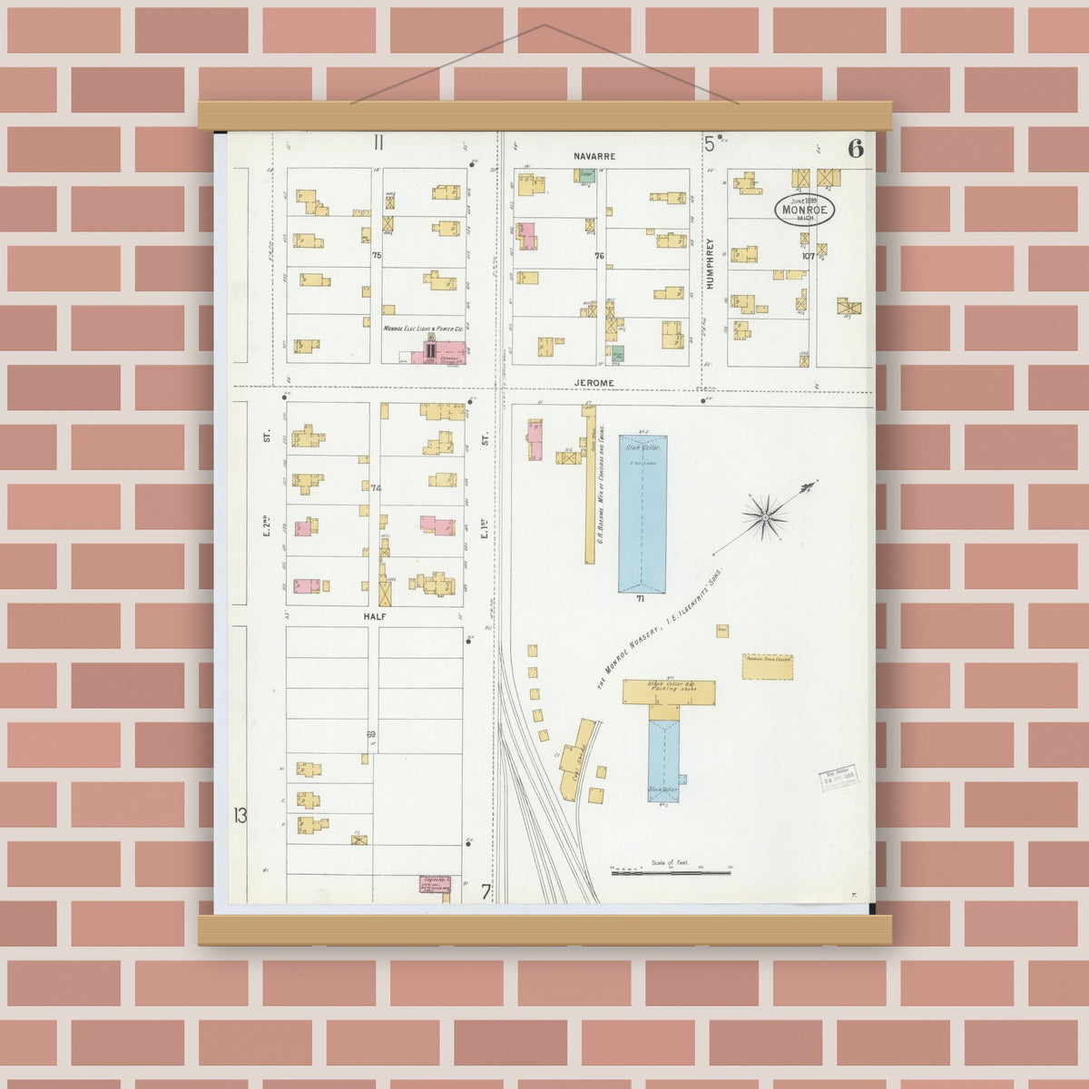 Old map wall art mockup — magnetic wood frame on brick wall — Sanborn Fire Insurance Map from Monroe, Monroe County, Michigan (1899), Sheet #0006