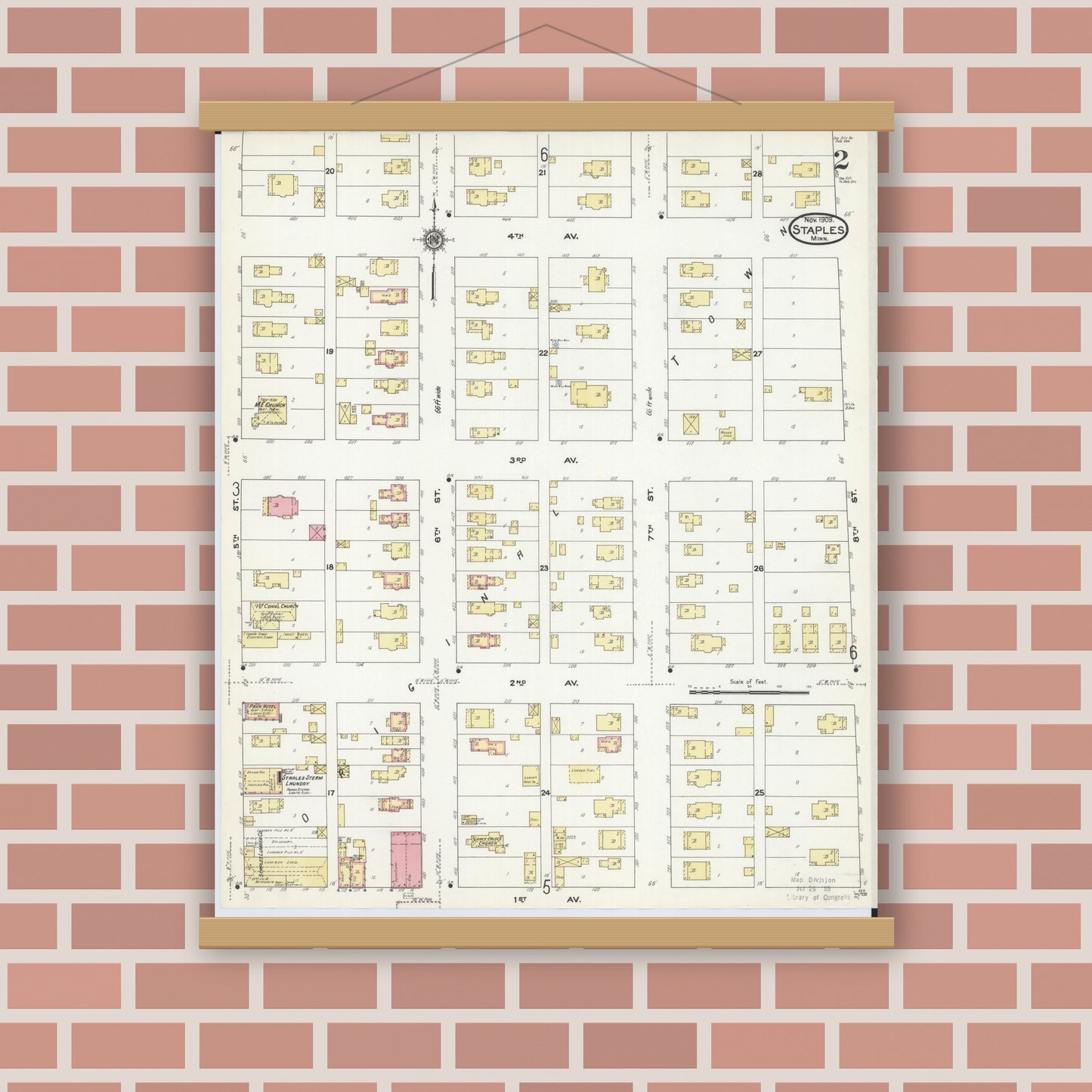 Old map wall art mockup — magnetic wood frame on brick wall — Sanborn Fire Insurance Map from Staples, Todd County, Minnesota (1909), Sheet #0002