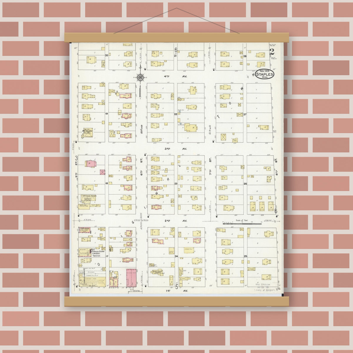 Old map wall art mockup — magnetic wood frame on brick wall — Sanborn Fire Insurance Map from Staples, Todd County, Minnesota (1909), Sheet #0002