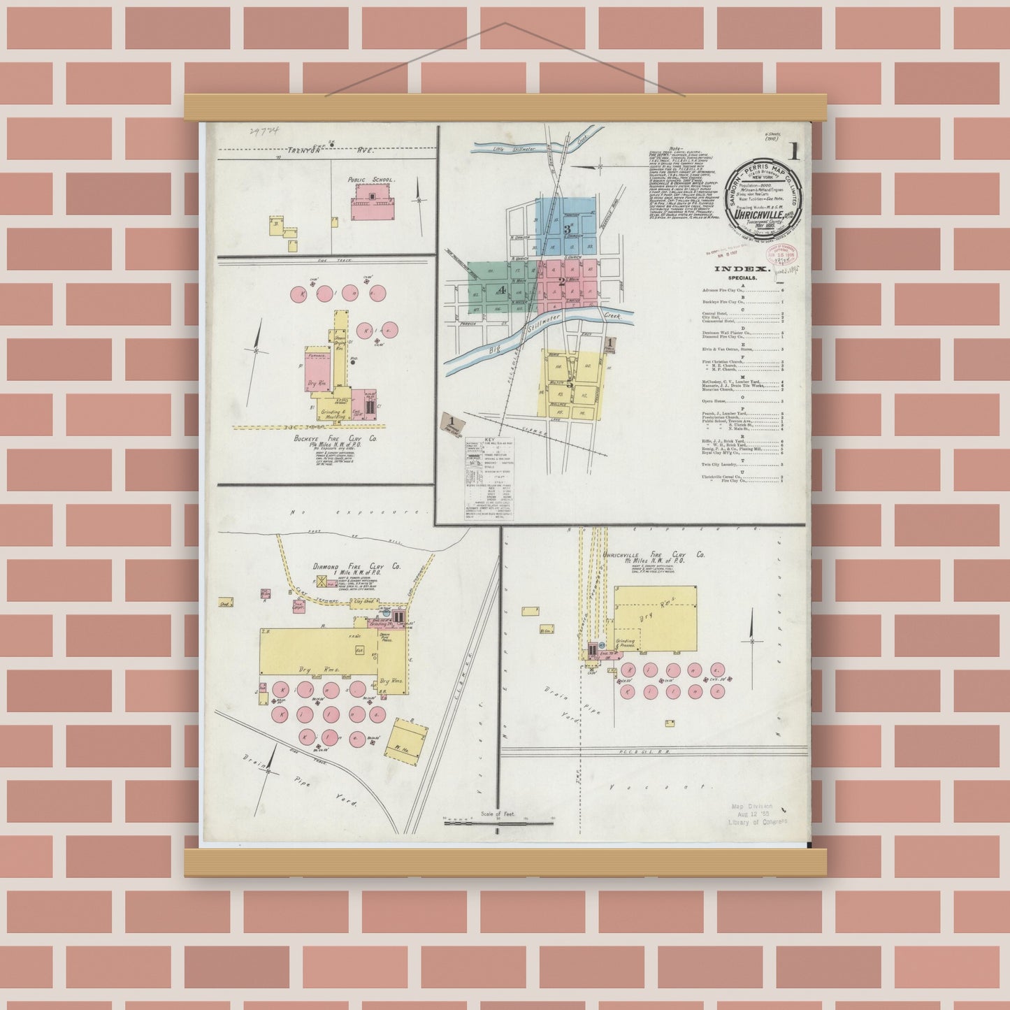 Old map wall art mockup — magnetic wood frame on brick wall — Sanborn Fire Insurance Map from Uhrichsville, Tuscarawas County, Ohio (1895), Sheet #0001