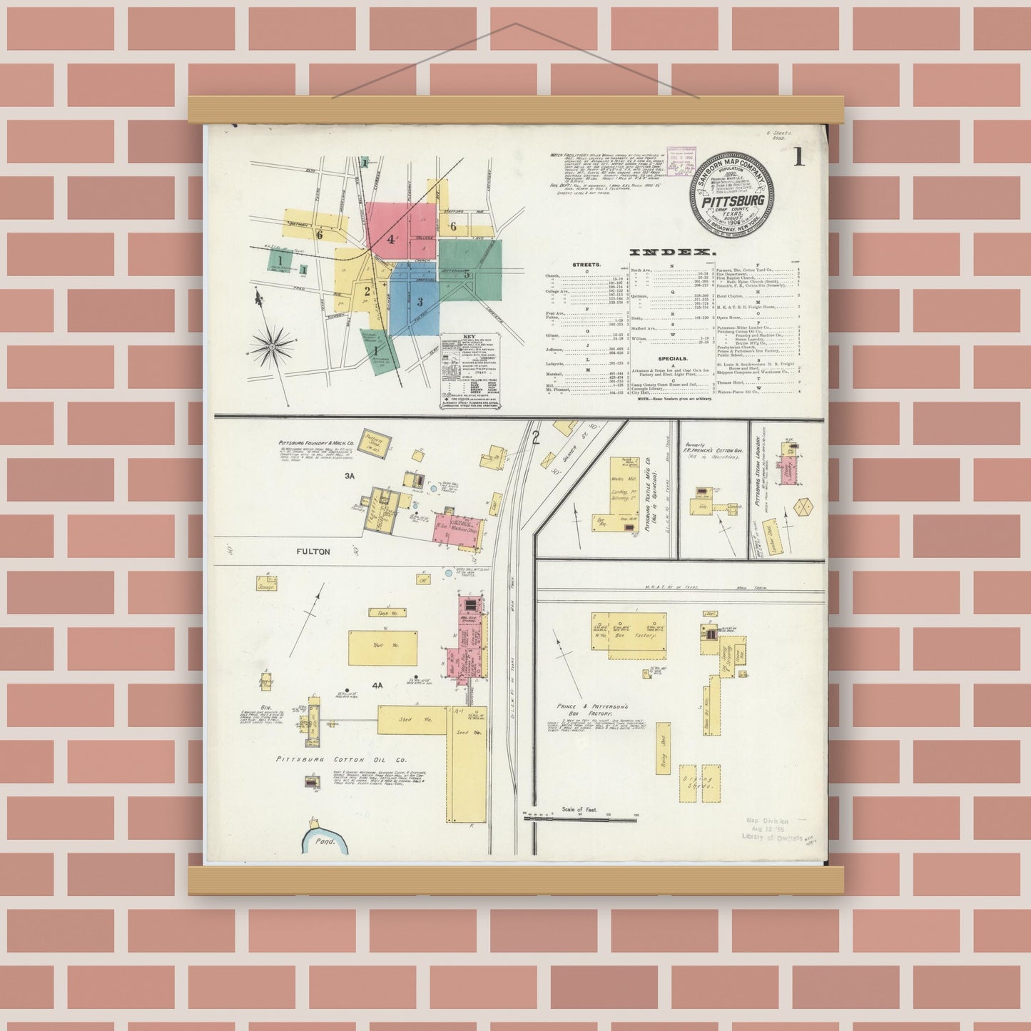 Old map wall art mockup — magnetic wood frame on brick wall — Sanborn Fire Insurance Map from Pittsburg, Camp County, Texas (1906), Sheet #0001