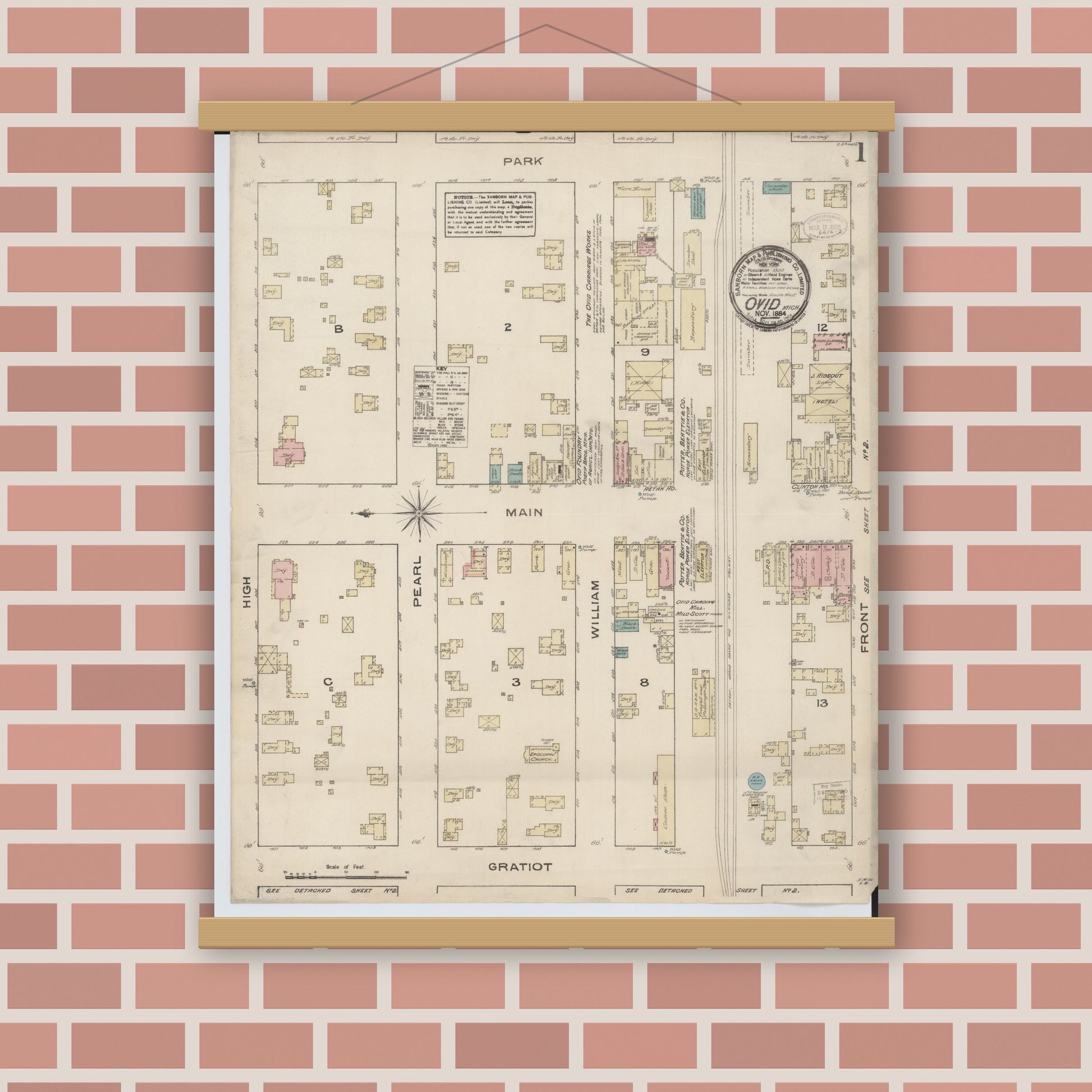 Old map wall art mockup — magnetic wood frame on brick wall — Sanborn Fire Insurance Map from Ovid, Clinton County, Michigan (1884) - Complete Map Set