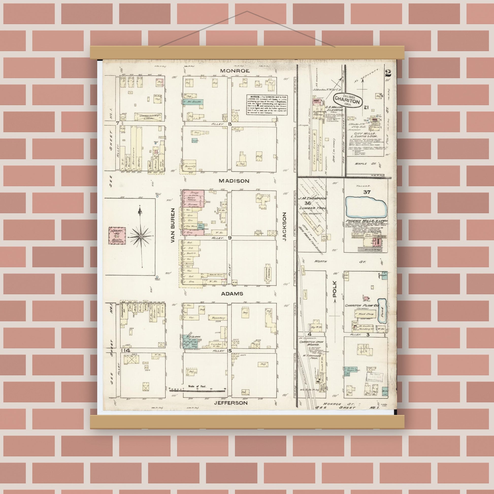 Old map wall art mockup — magnetic wood frame on brick wall — Sanborn Fire Insurance Map from Chariton, Lucas County, Iowa (1883), Sheet #0002