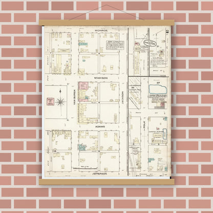 Old map wall art mockup — magnetic wood frame on brick wall — Sanborn Fire Insurance Map from Chariton, Lucas County, Iowa (1883), Sheet #0002