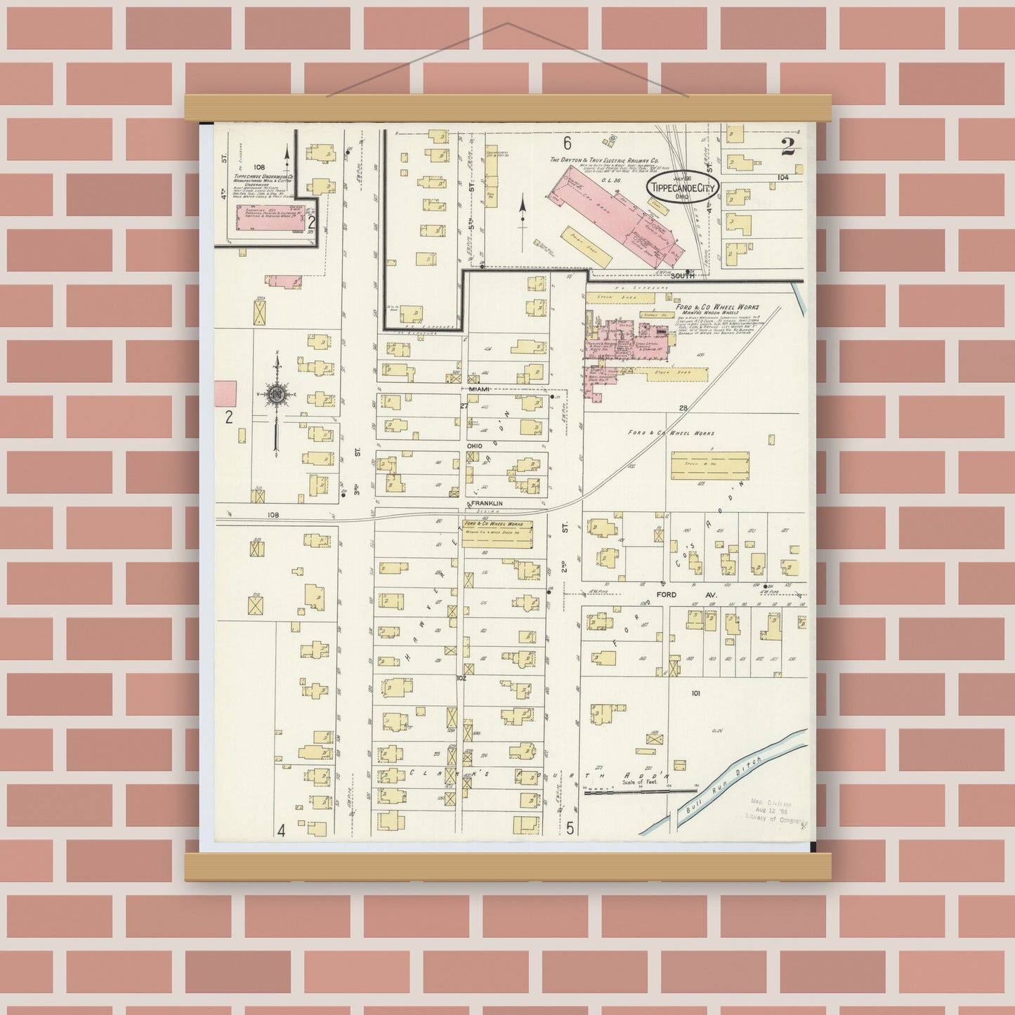 Old map wall art mockup — magnetic wood frame on brick wall — Sanborn Fire Insurance Map from Tipp City, Miami County, Ohio (1911), Sheet #0002