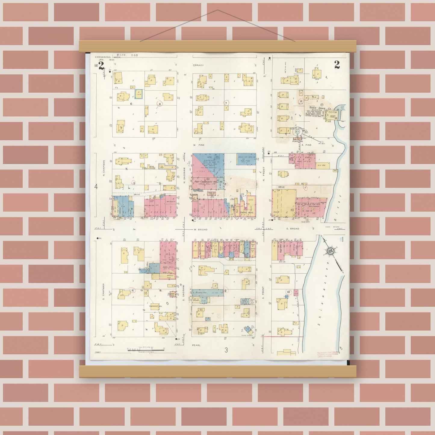 Old map wall art mockup — magnetic wood frame on brick wall — Sanborn Fire Insurance Map from Chesaning, Saginaw County, Michigan (1944), Sheet #0002
