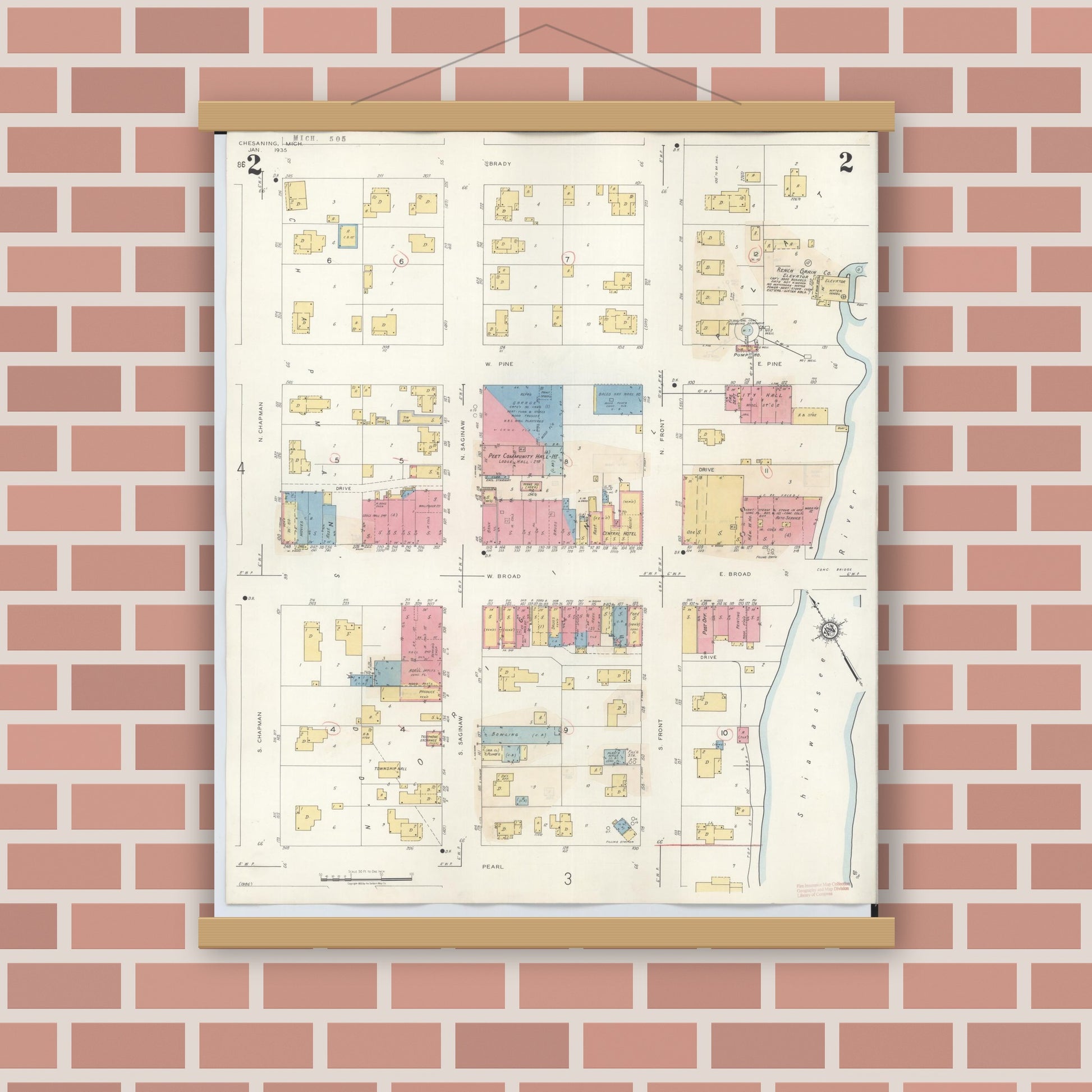 Old map wall art mockup — magnetic wood frame on brick wall — Sanborn Fire Insurance Map from Chesaning, Saginaw County, Michigan (1944), Sheet #0002