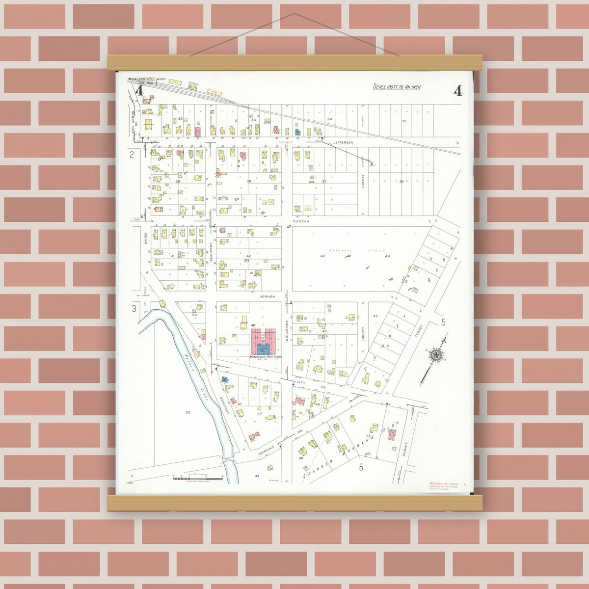 Old map wall art mockup — magnetic wood frame on brick wall — Sanborn Fire Insurance Map from Manchester, Washtenaw County, Michigan (1941), Sheet #0004