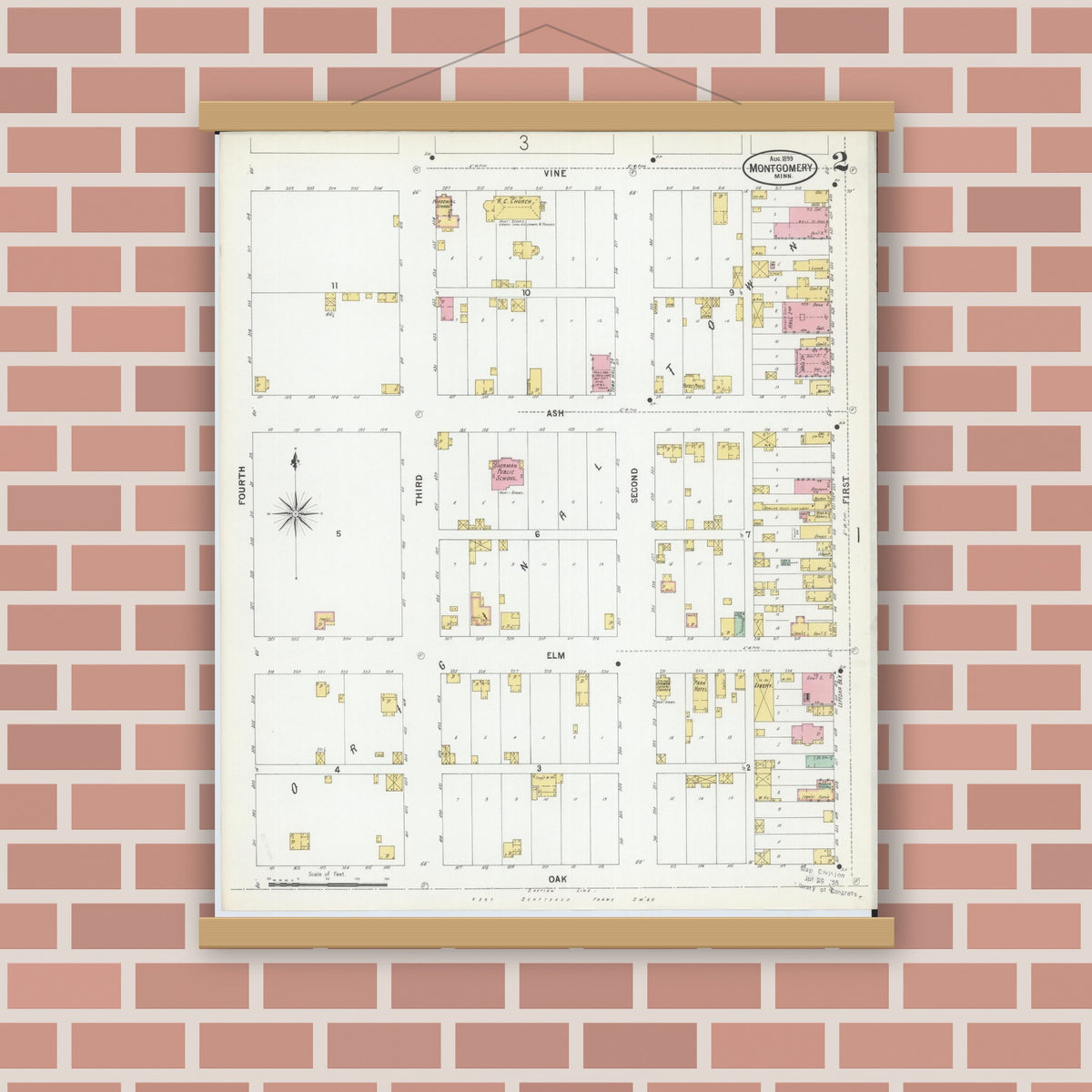 Old map wall art mockup — magnetic wood frame on brick wall — Sanborn Fire Insurance Map from Montgomery, Le Sueur  County, Minnesota (1899), Sheet #0002