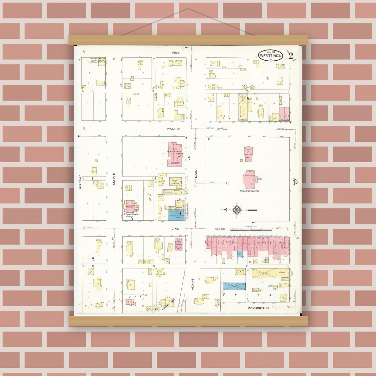 Old map wall art mockup — magnetic wood frame on brick wall — Sanborn Fire Insurance Map from West Union, Fayette County, Iowa (1913), Sheet #0002