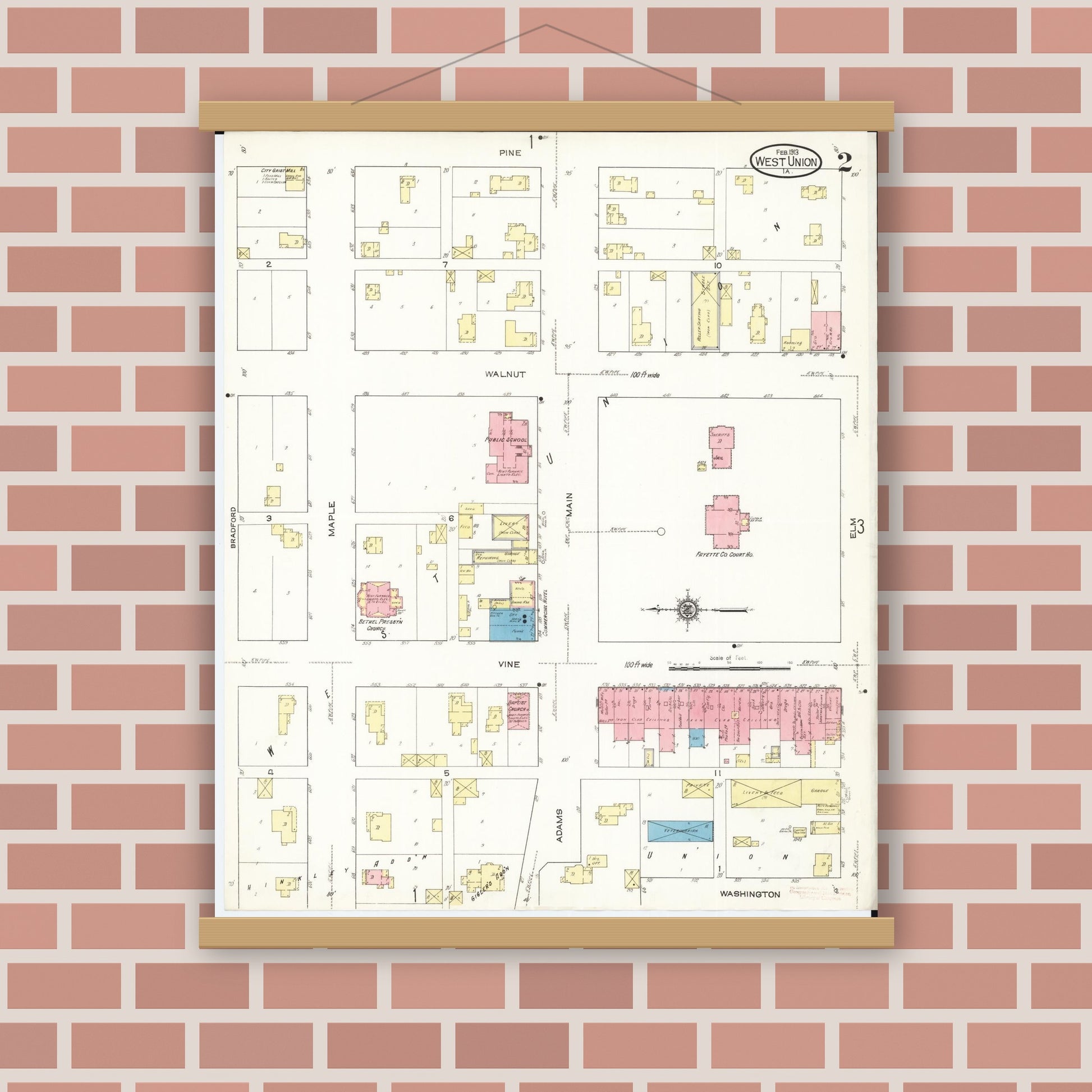 Old map wall art mockup — magnetic wood frame on brick wall — Sanborn Fire Insurance Map from West Union, Fayette County, Iowa (1913), Sheet #0002