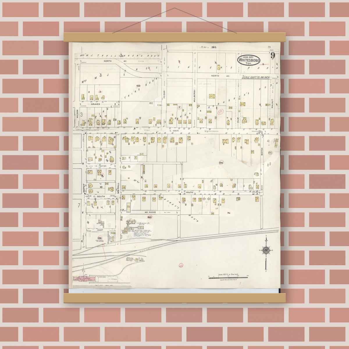 Old map wall art mockup — magnetic wood frame on brick wall — Sanborn Fire Insurance Map from Whitesboro, Grayson County, Texas (1943), Sheet #0009