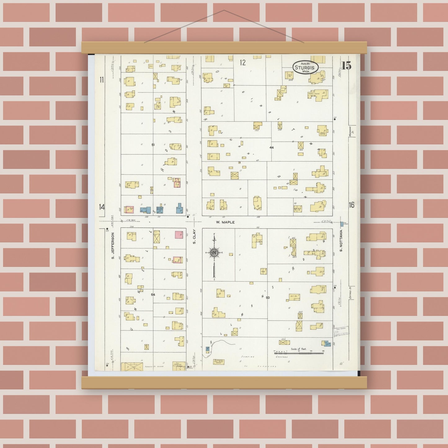 Old map wall art mockup — magnetic wood frame on brick wall — Sanborn Fire Insurance Map from Sturgis, Saint Joseph County, Michigan (1911), Sheet #0015