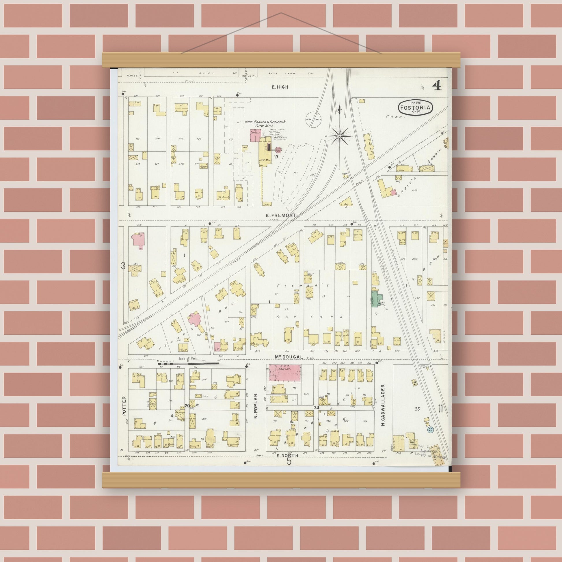 Old map wall art mockup — magnetic wood frame on brick wall — Sanborn Fire Insurance Map from Fostoria, Seneca, Hancock, And Wood Counties, Ohio (1896), Sheet #0004