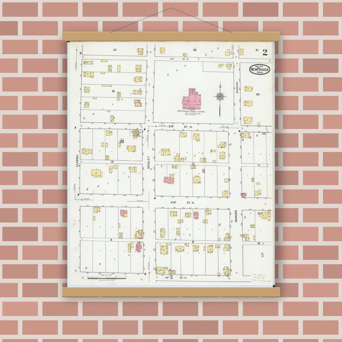 Old map wall art mockup — magnetic wood frame on brick wall — Sanborn Fire Insurance Map from New Prague, Scott And Le Sueur, Minnesota (1919), Sheet #0002