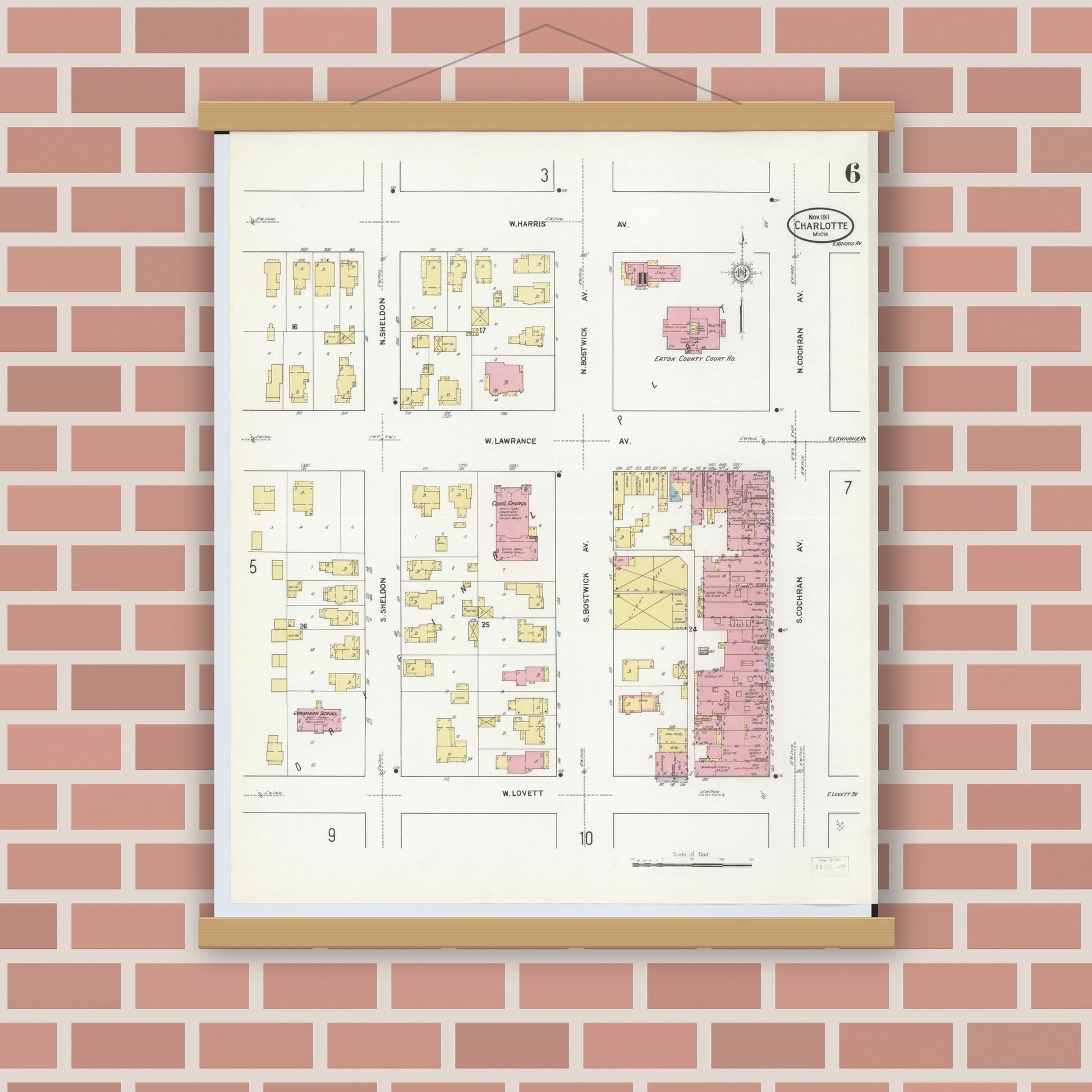 Old map wall art mockup — magnetic wood frame on brick wall — Sanborn Fire Insurance Map from Charlotte, Eaton County, Michigan (1911), Sheet #0006
