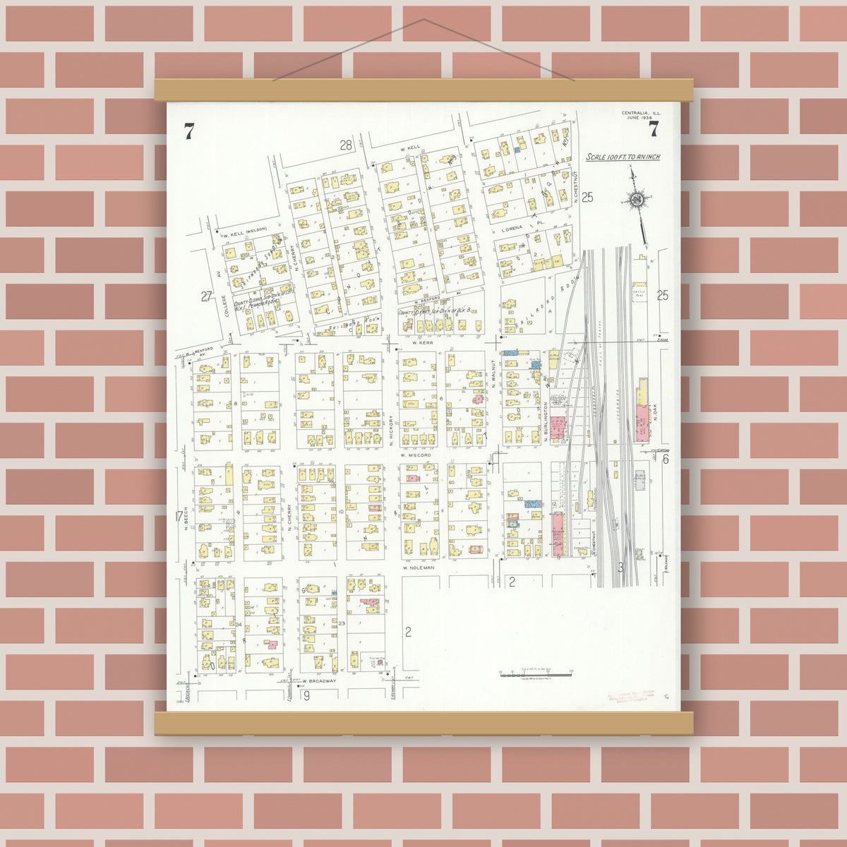 Old map wall art mockup — magnetic wood frame on brick wall — Sanborn Fire Insurance Map from Centralia, Marion, Clinton, Jefferson, and Washington Counties, Illinois (1938), Sheet #0007