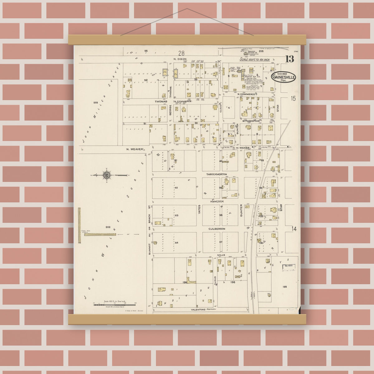 Old map wall art mockup — magnetic wood frame on brick wall — Sanborn Fire Insurance Map from Gainesville, Cooke County, Texas (1922), Sheet #0013
