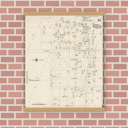 Old map wall art mockup — magnetic wood frame on brick wall — Sanborn Fire Insurance Map from Gainesville, Cooke County, Texas (1922), Sheet #0013