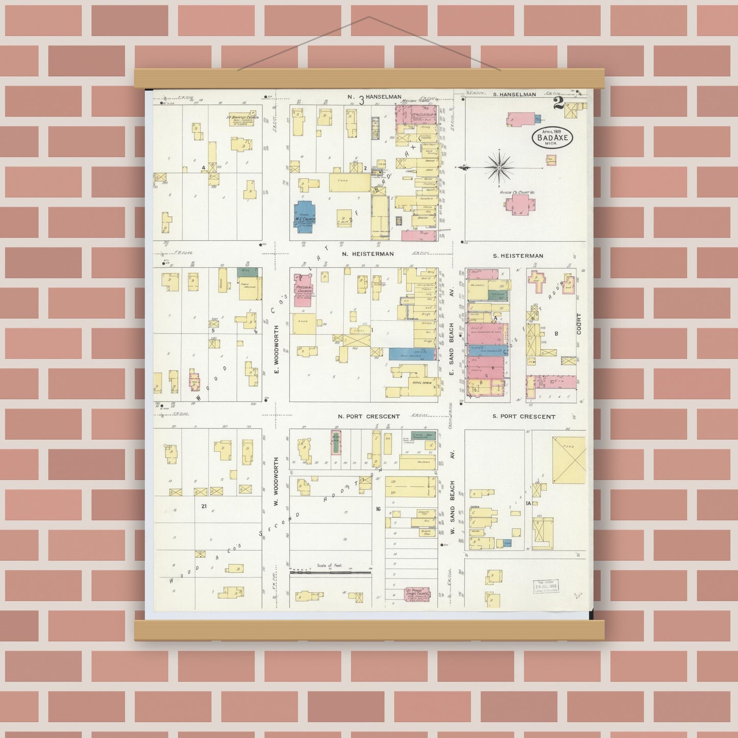 Old map wall art mockup — magnetic wood frame on brick wall — Sanborn Fire Insurance Map from Bad Axe, Huron County, Michigan (1909), Sheet #0002