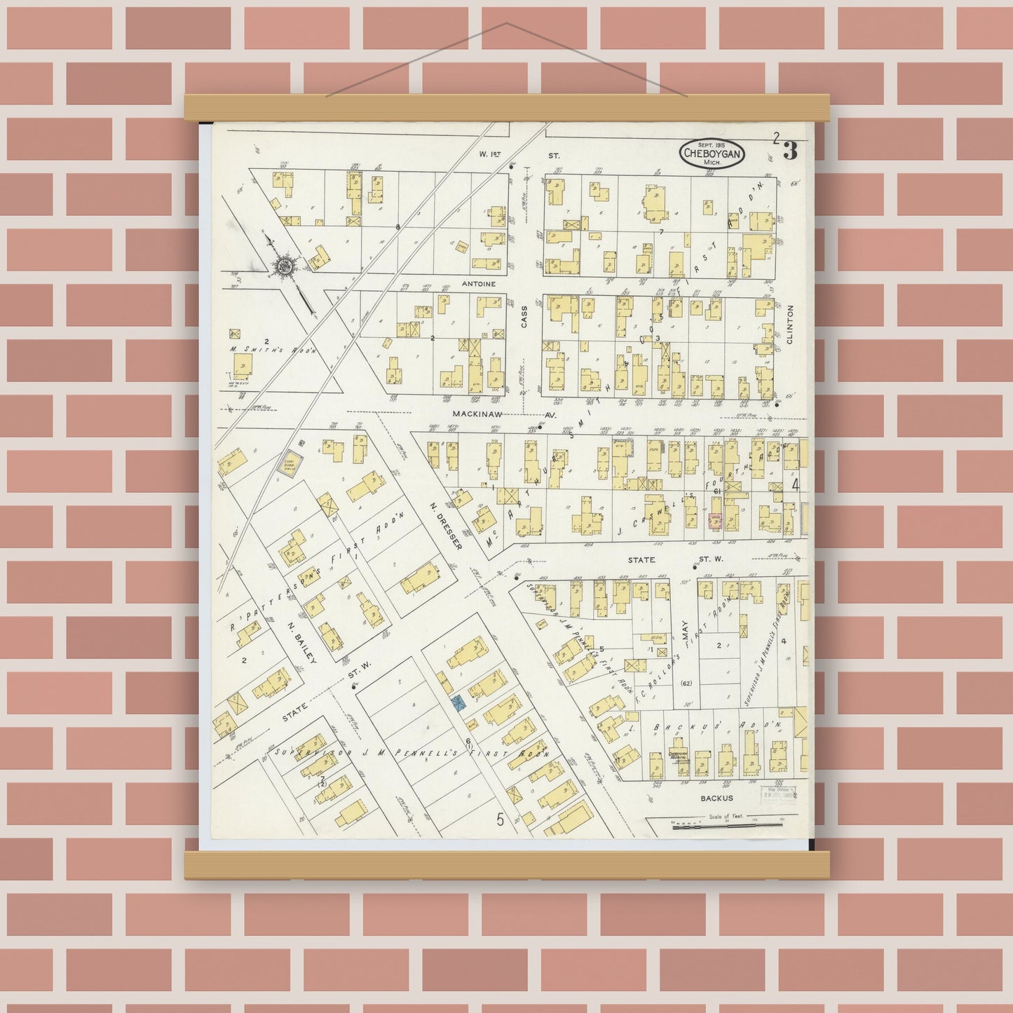 Old map wall art mockup — magnetic wood frame on brick wall — Sanborn Fire Insurance Map from Cheboygan, Cheboygan County, Michigan (1915), Sheet #0003