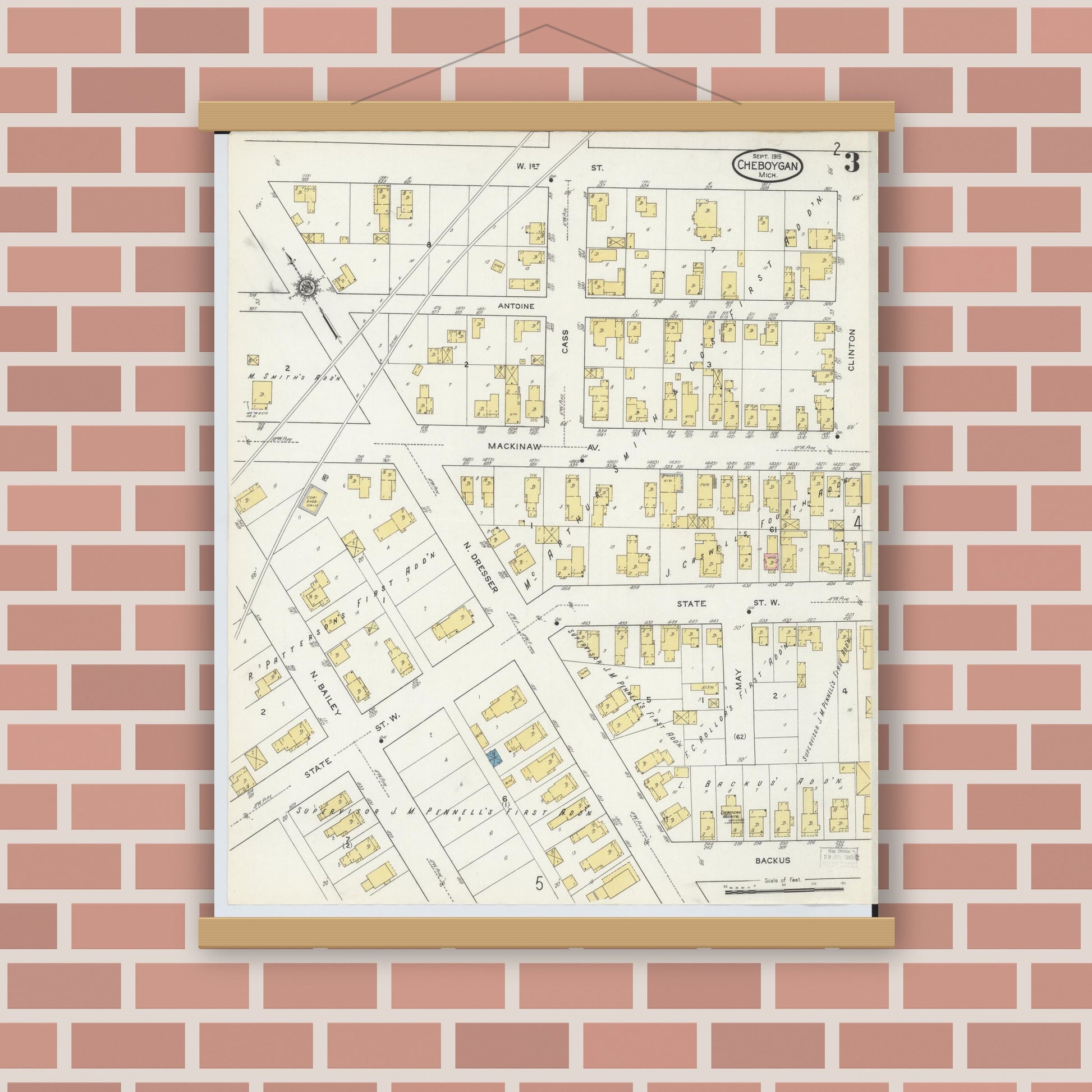Old map wall art mockup — magnetic wood frame on brick wall — Sanborn Fire Insurance Map from Cheboygan, Cheboygan County, Michigan (1915), Sheet #0003