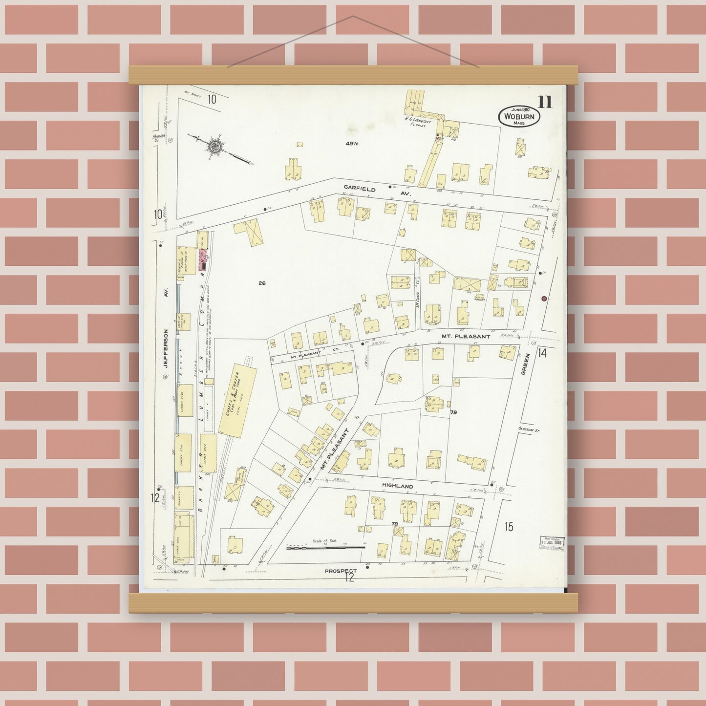 Old map wall art mockup — magnetic wood frame on brick wall — Sanborn Fire Insurance Map from Woburn, Middlesex County, Massachusetts (1910), Sheet #0011