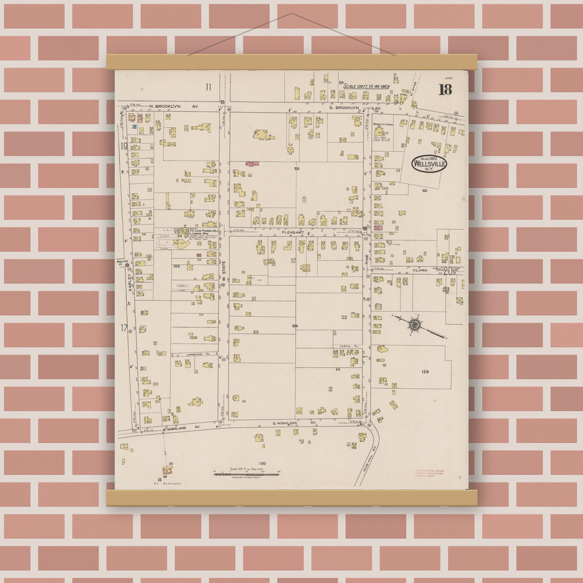 Old map wall art mockup — magnetic wood frame on brick wall — Sanborn Fire Insurance Map from Wellsville, Allegany County, New York (1922), Sheet #0018