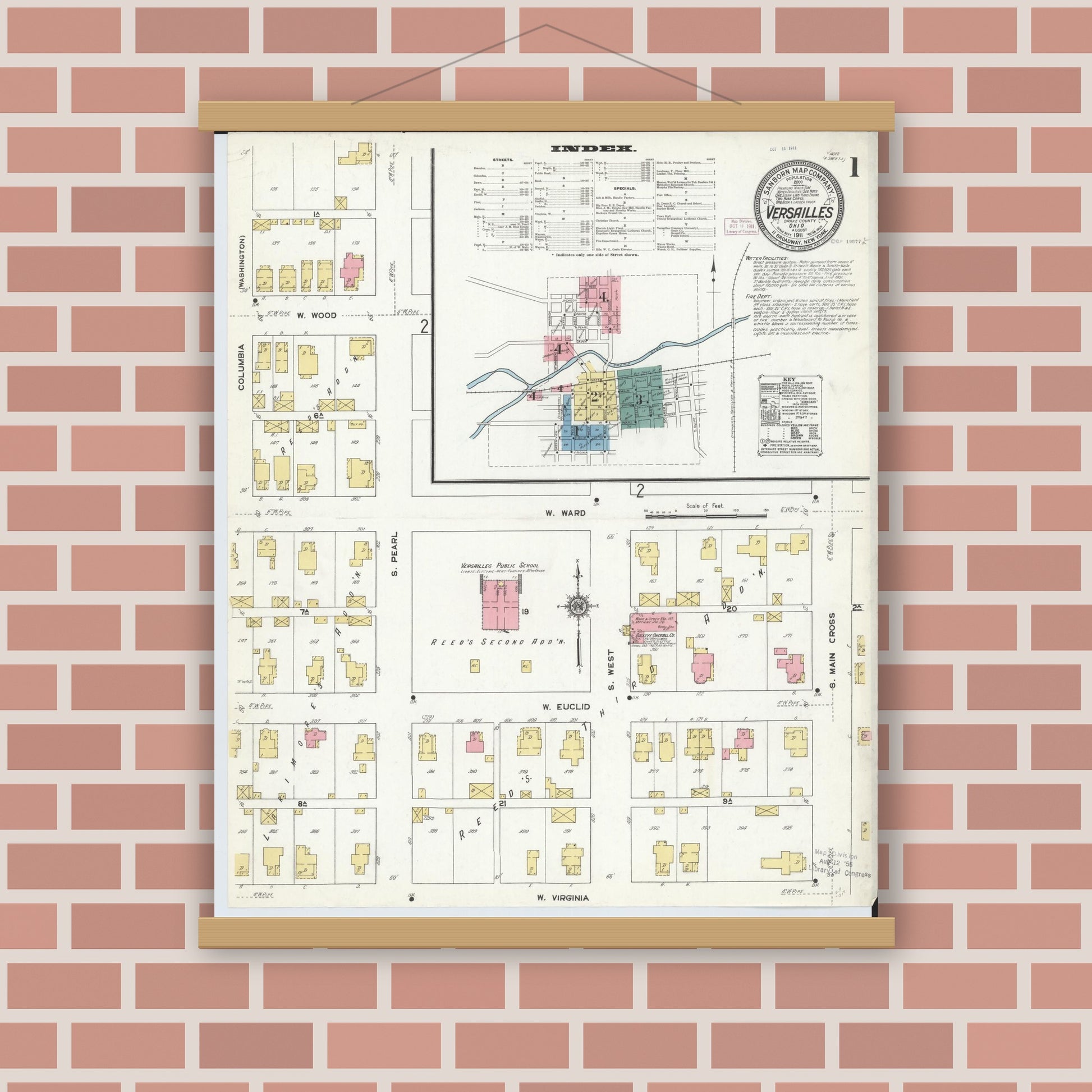 Old map wall art mockup — magnetic wood frame on brick wall — Sanborn Fire Insurance Map from Versailles, Darke County, Ohio (1911), Sheet #0001