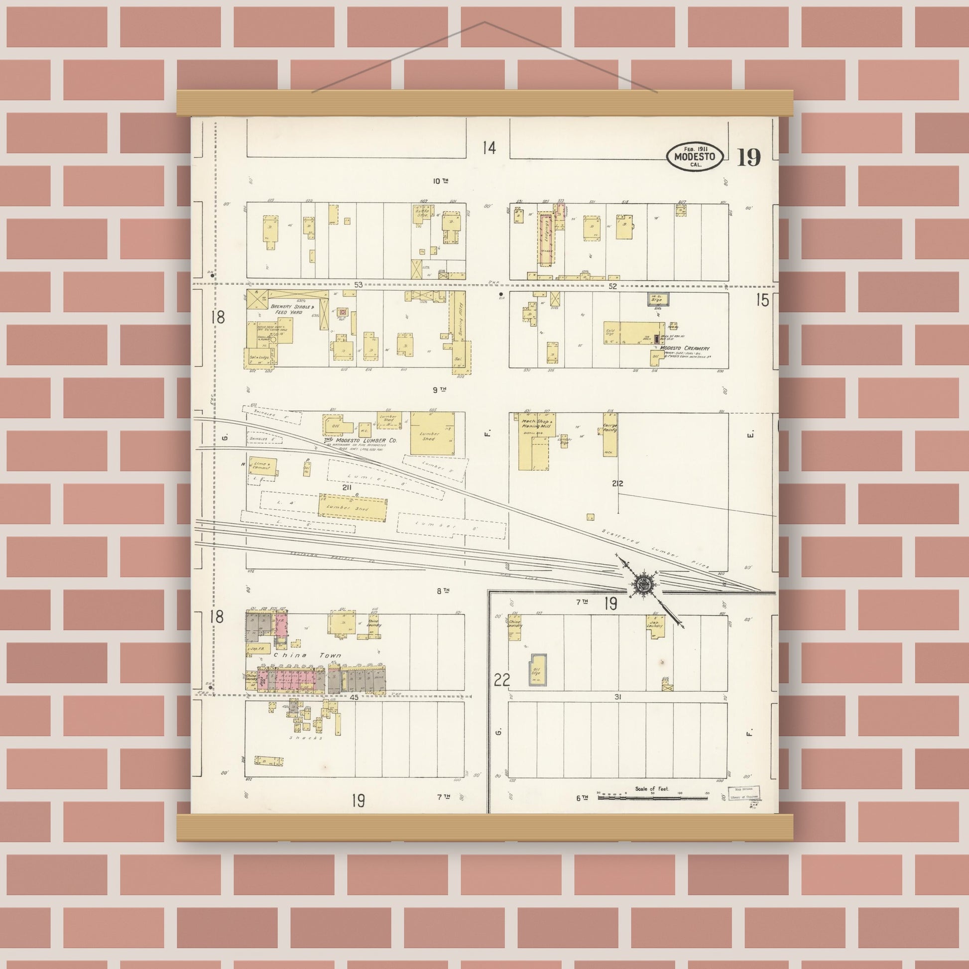 Old map wall art mockup — magnetic wood frame on brick wall — Sanborn Fire Insurance Map from Modesto, Stanislaus County, California (1911), Sheet #0019