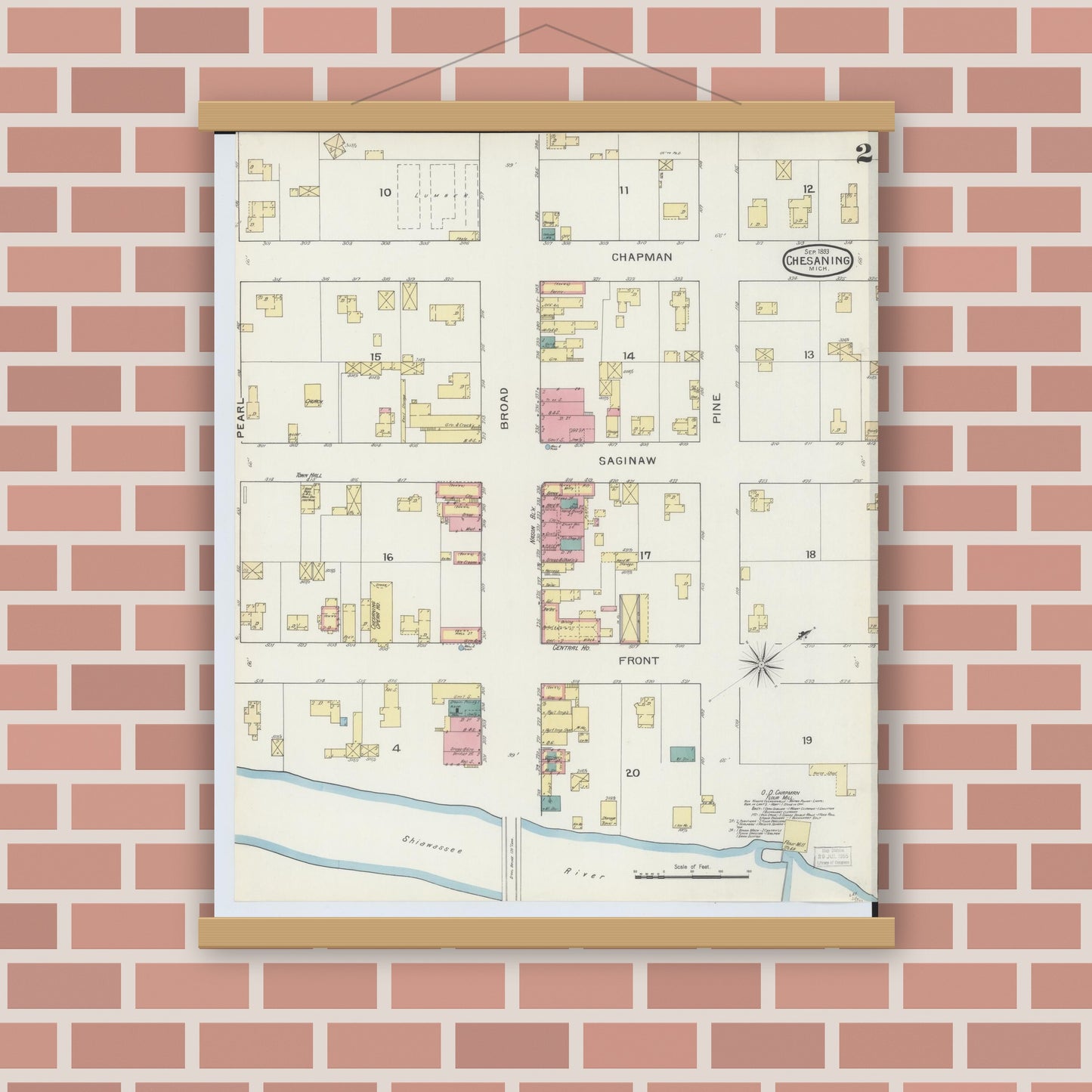 Old map wall art mockup — magnetic wood frame on brick wall — Sanborn Fire Insurance Map from Chesaning, Saginaw County, Michigan (1893), Sheet #0002
