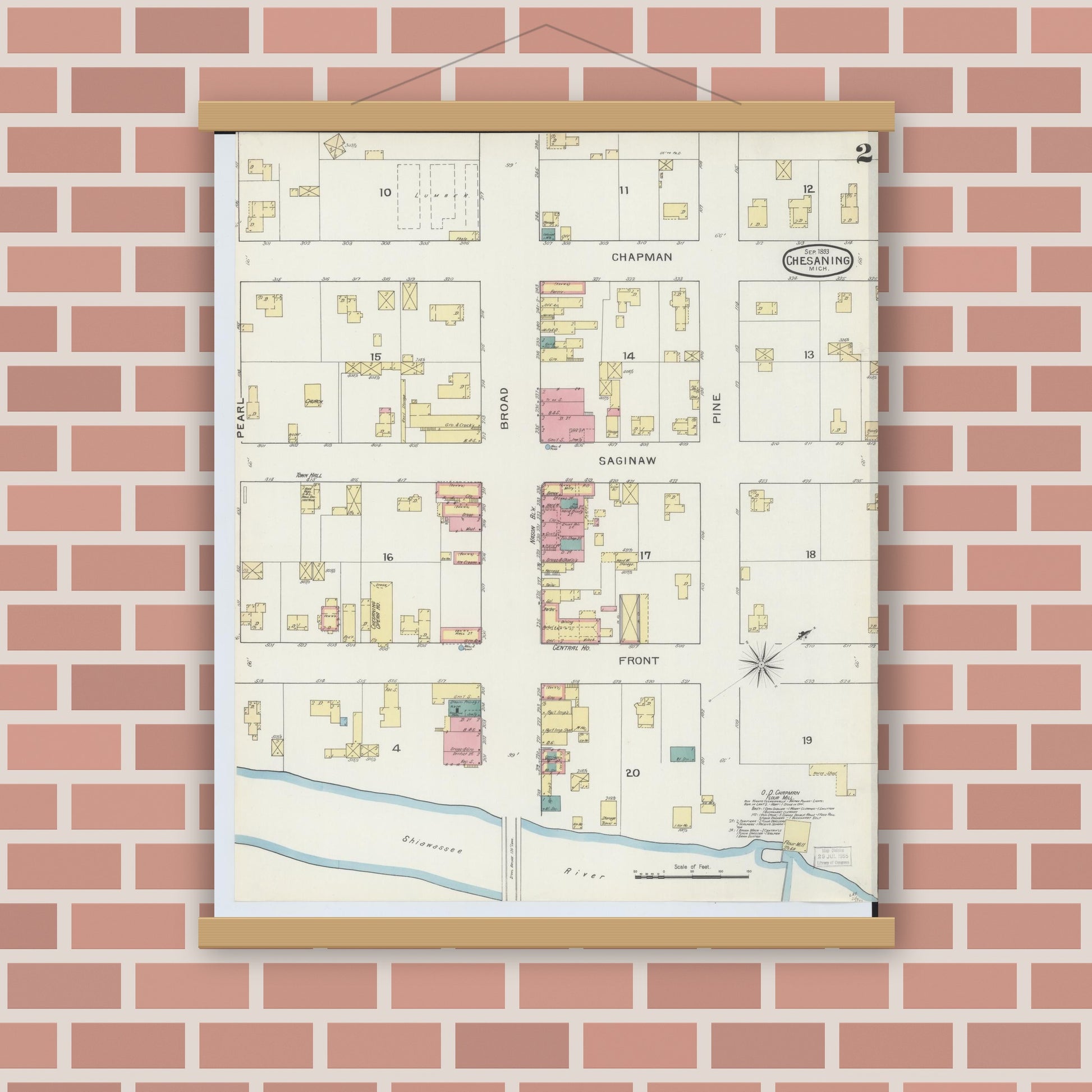 Old map wall art mockup — magnetic wood frame on brick wall — Sanborn Fire Insurance Map from Chesaning, Saginaw County, Michigan (1893), Sheet #0002