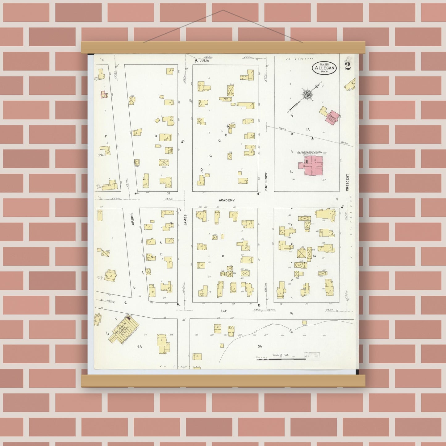 Old map wall art mockup — magnetic wood frame on brick wall — Sanborn Fire Insurance Map from Allegan, Allegan County, Michigan (1911), Sheet #0002