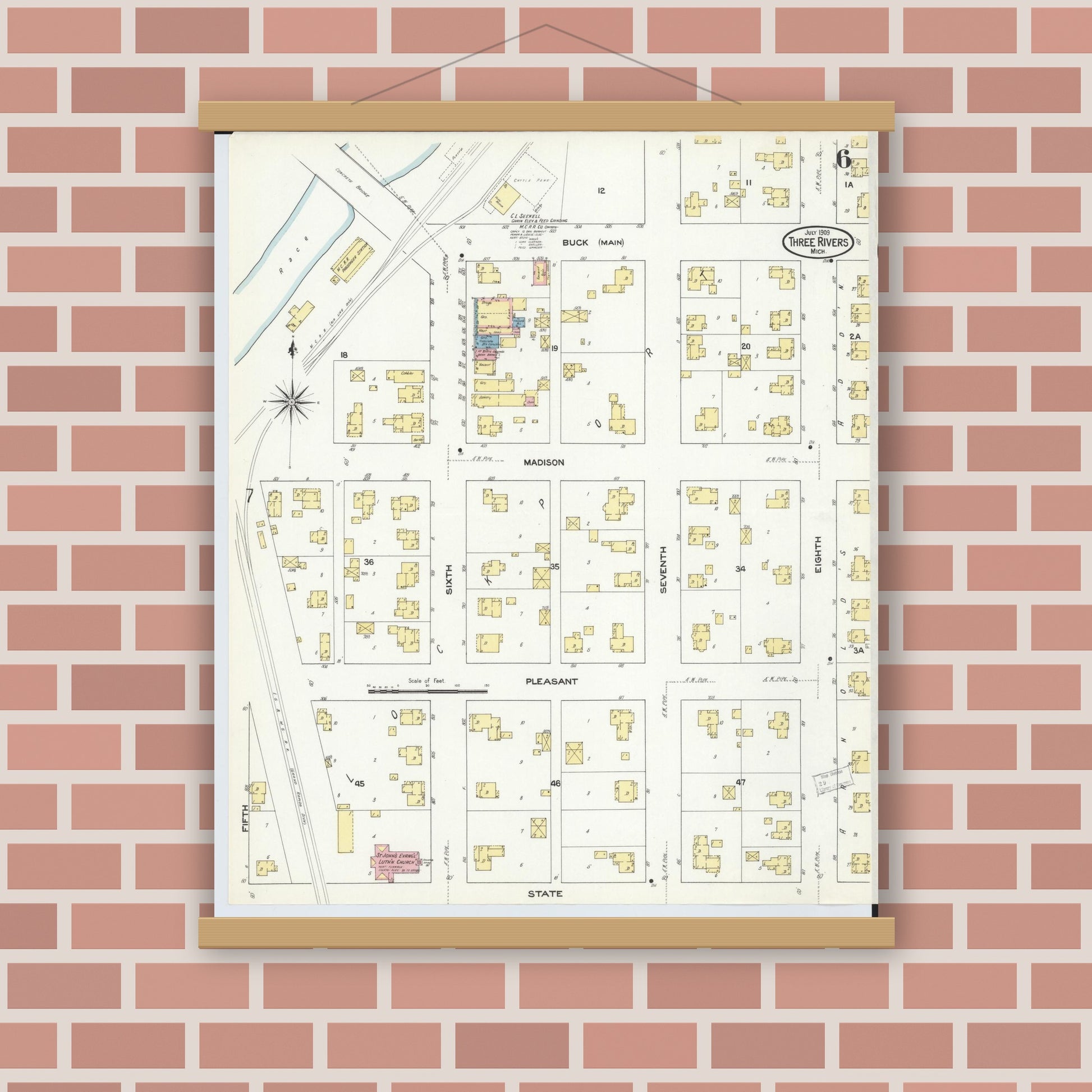 Old map wall art mockup — magnetic wood frame on brick wall — Sanborn Fire Insurance Map from Three Rivers, Saint Joseph County, Michigan (1909), Sheet #0006