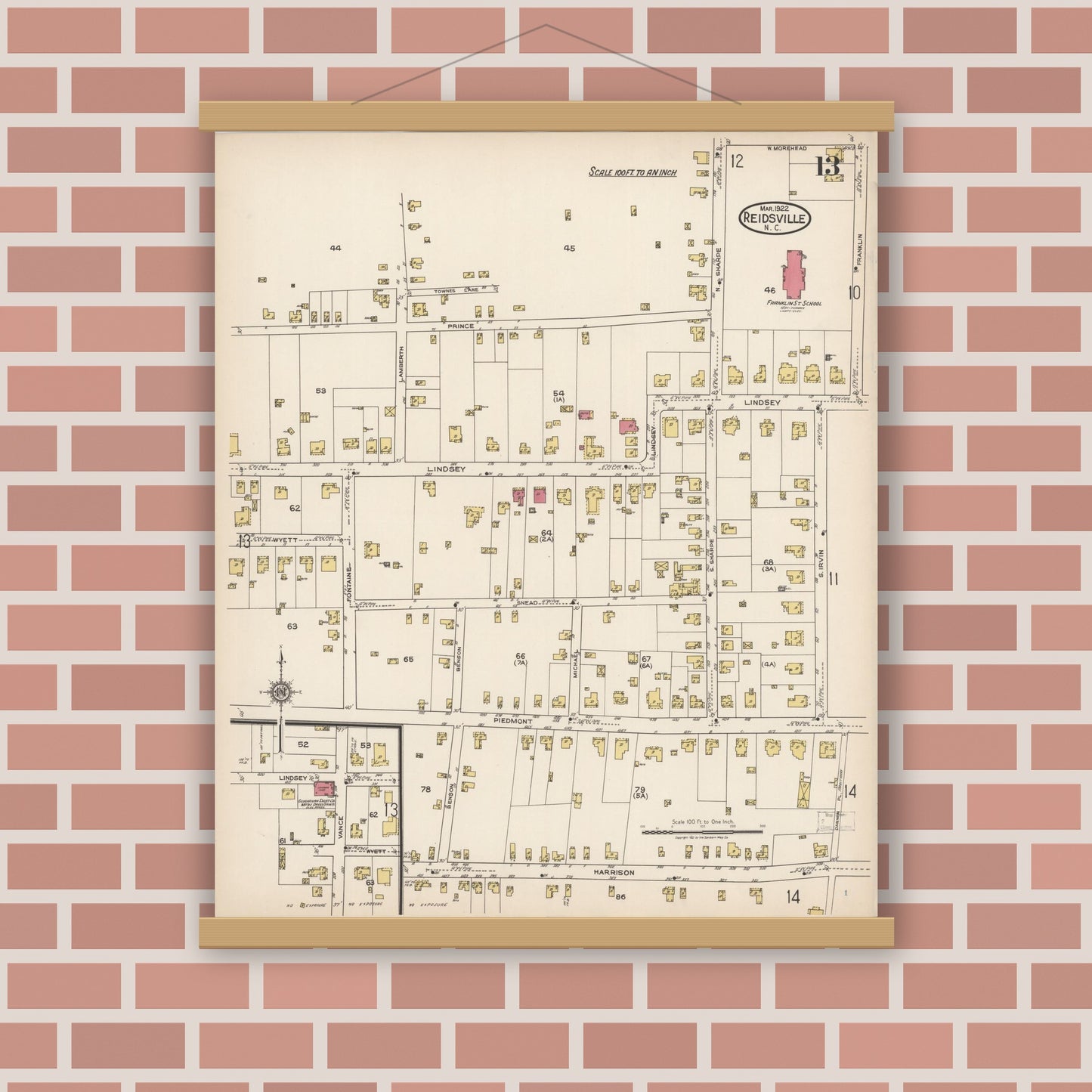 Old map wall art mockup — magnetic wood frame on brick wall — Sanborn Fire Insurance Map from Reidsville, Rockingham County, North Carolina (1922), Sheet #0013