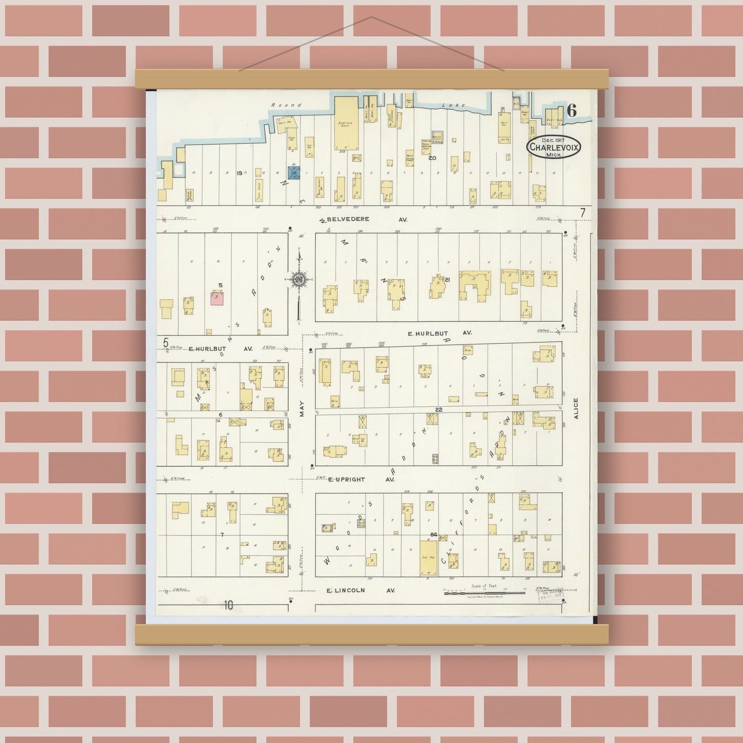 Old map wall art mockup — magnetic wood frame on brick wall — Sanborn Fire Insurance Map from Charlevoix, Charlevoix County, Michigan (1917), Sheet #0006